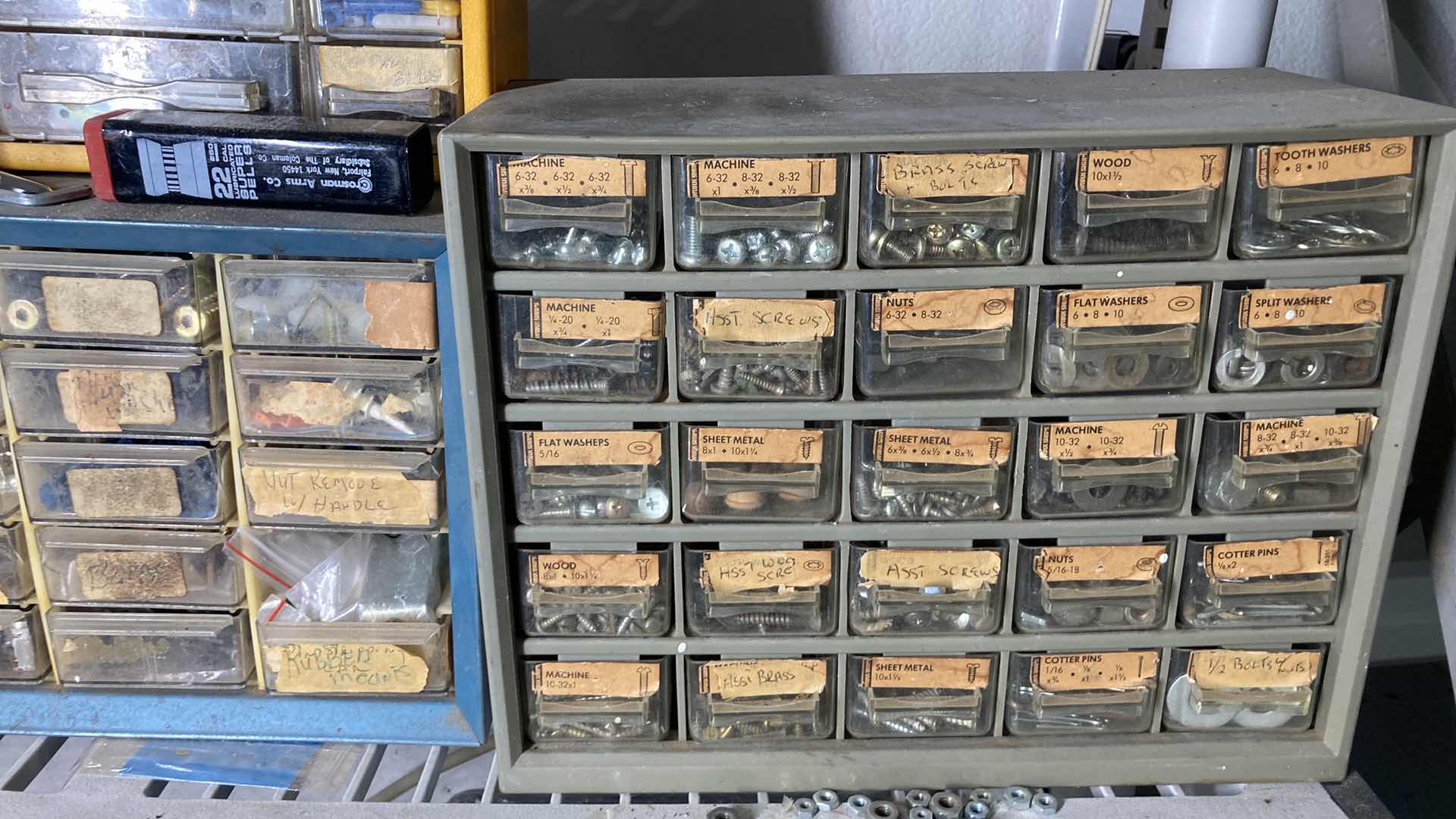 Photo 2 of CONTENTS OF SHELF-HARDWARE STORAGE CONTAINERS (4) W MULTIPURPOSE SAND PAPER