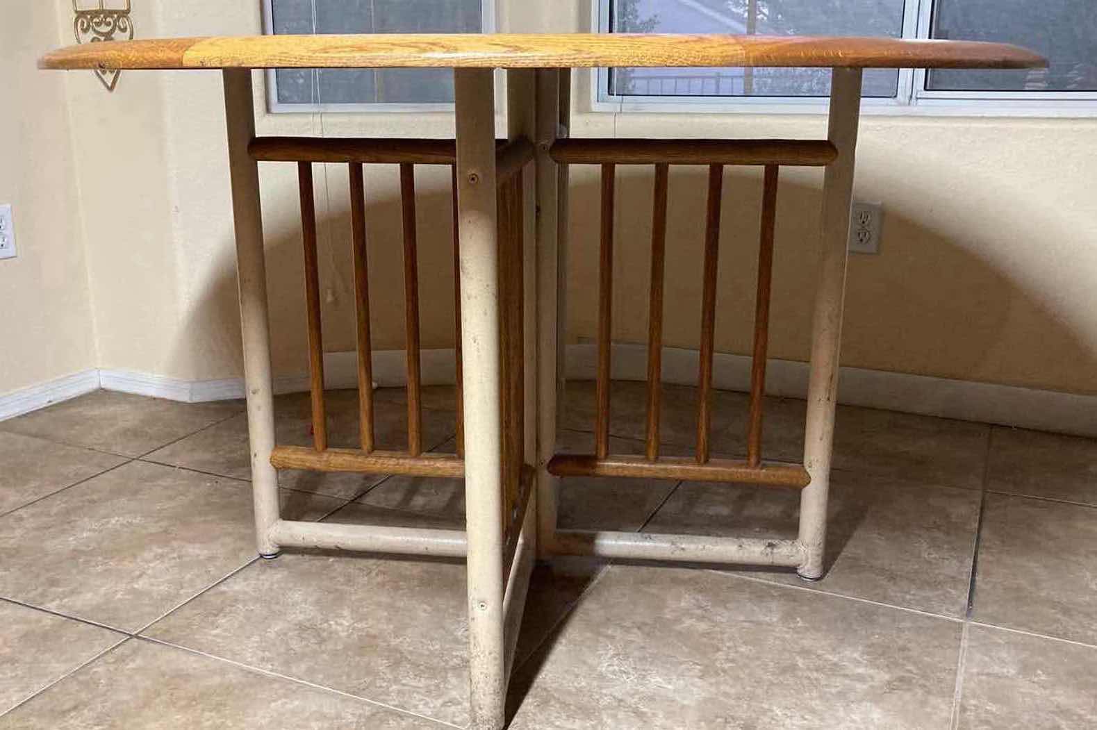 Photo 1 of VINTAGE ROUND OAK W METAL BASE DINING TABLE 48” X 29.5”