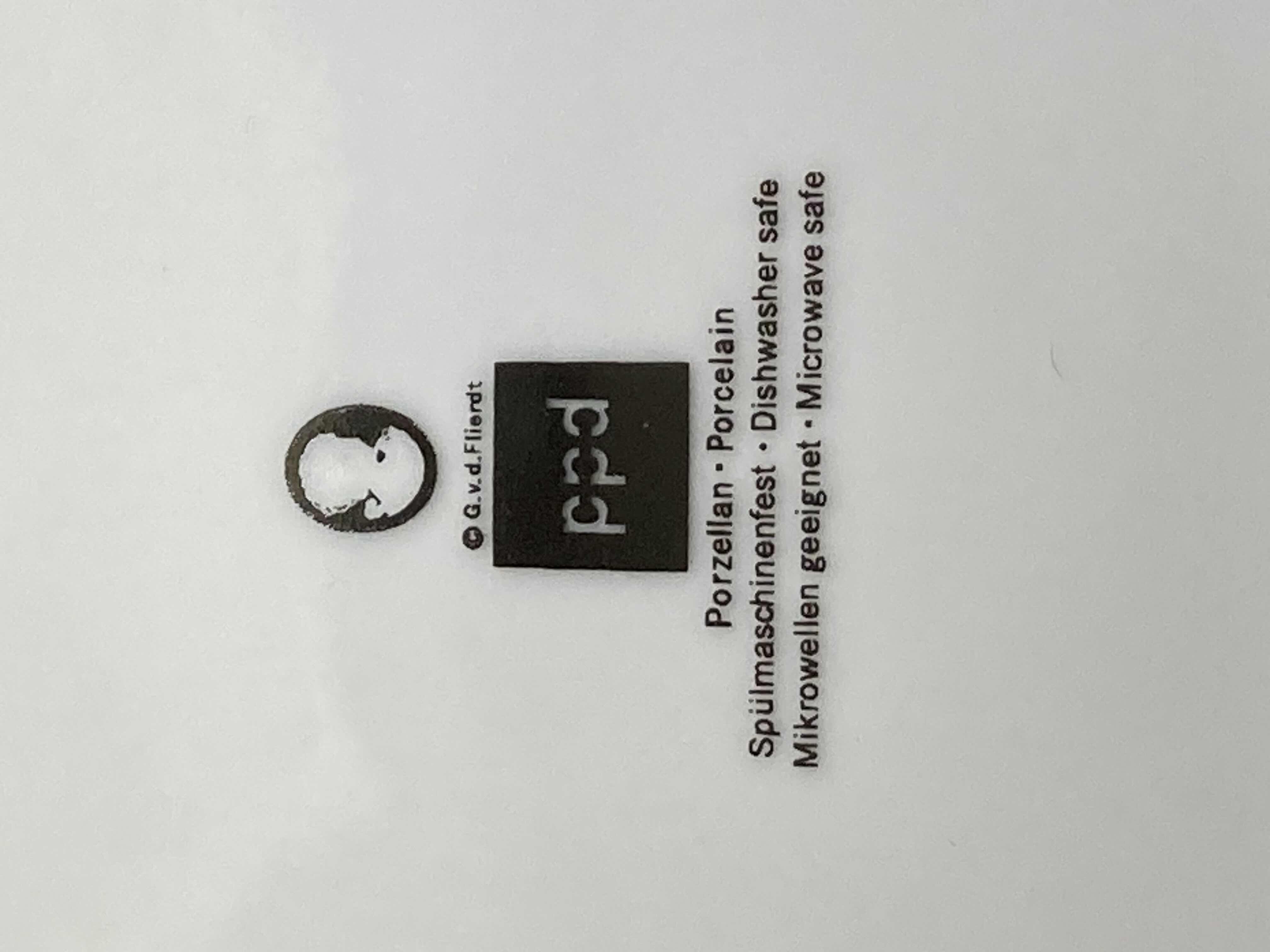 Photo 1 of PPD CAMEO BLACK & WHITE 8” PORCELAIN PLATE SET OF 4