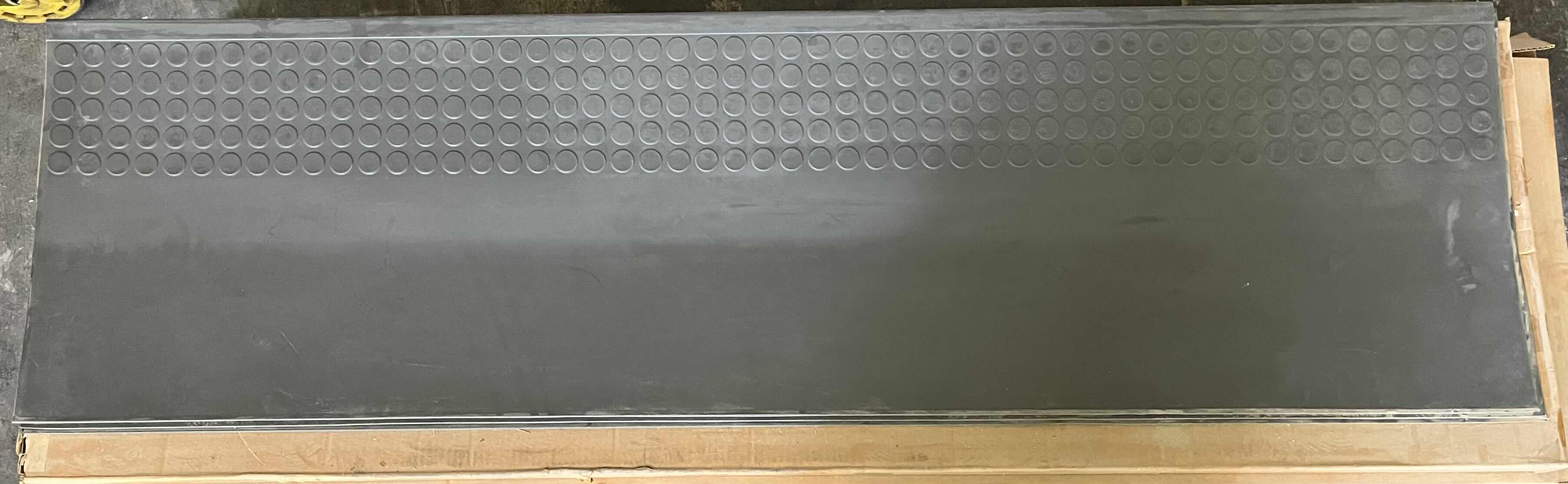 Photo 1 of ROPPE VANTAGE CIRCULAR PROFILE CHARCOAL GRAY RUBBER SQUARE NOSE STAIR TREAD 20.5” X 72.75” (1 CASE/6PCS)