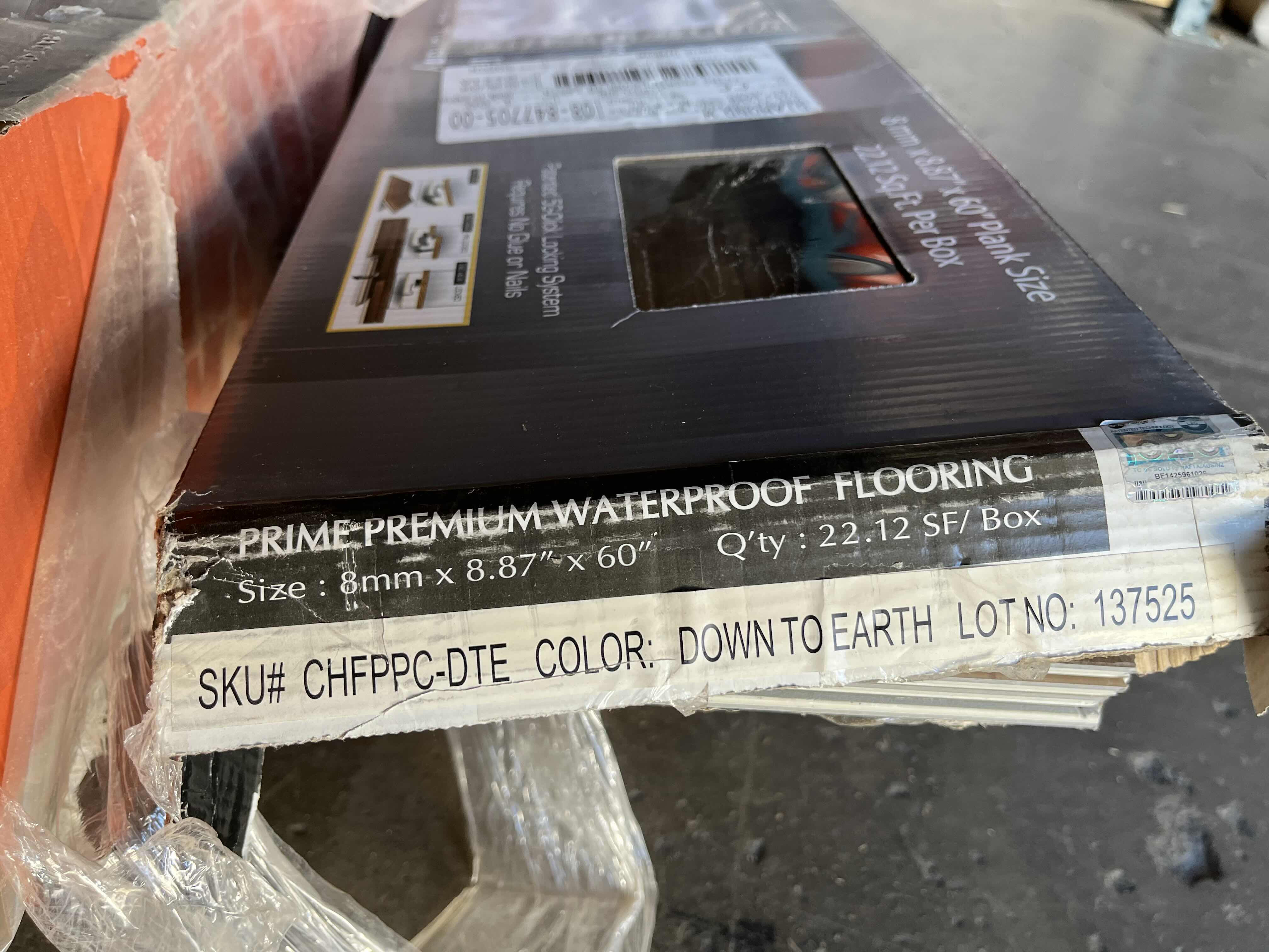 Photo 1 of MIXED FLOORING PALLET- VINYL & HARDWOOD PANEL FLOORING (7 BOXES)