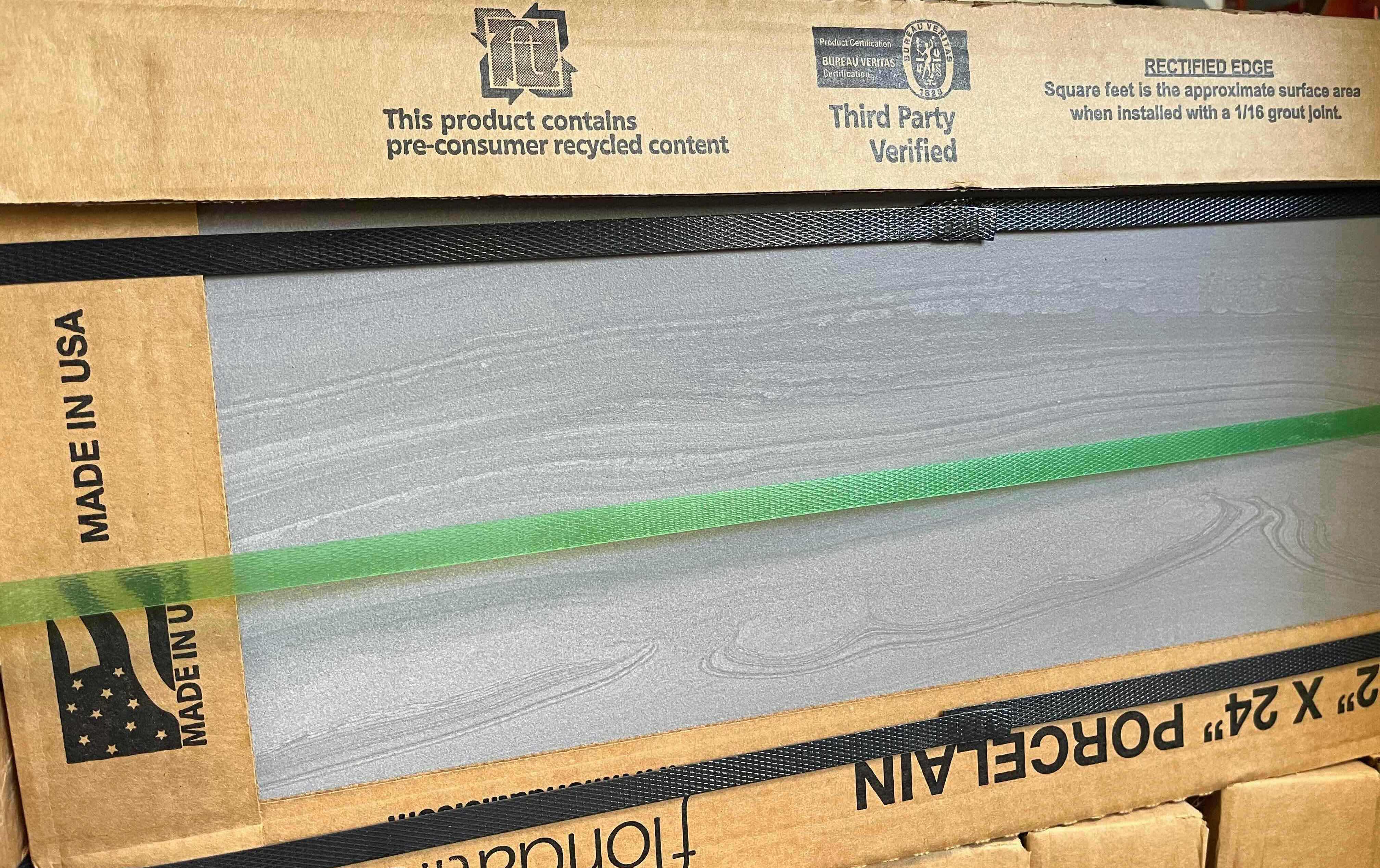 Photo 1 of FLORIDA TILE LIGHT GRAY MARBLED FINISH PORCELAIN TILE 12” X 24” (13.6sqft PER CASE/32CASES APPROX 435.2sqft TOTAL)