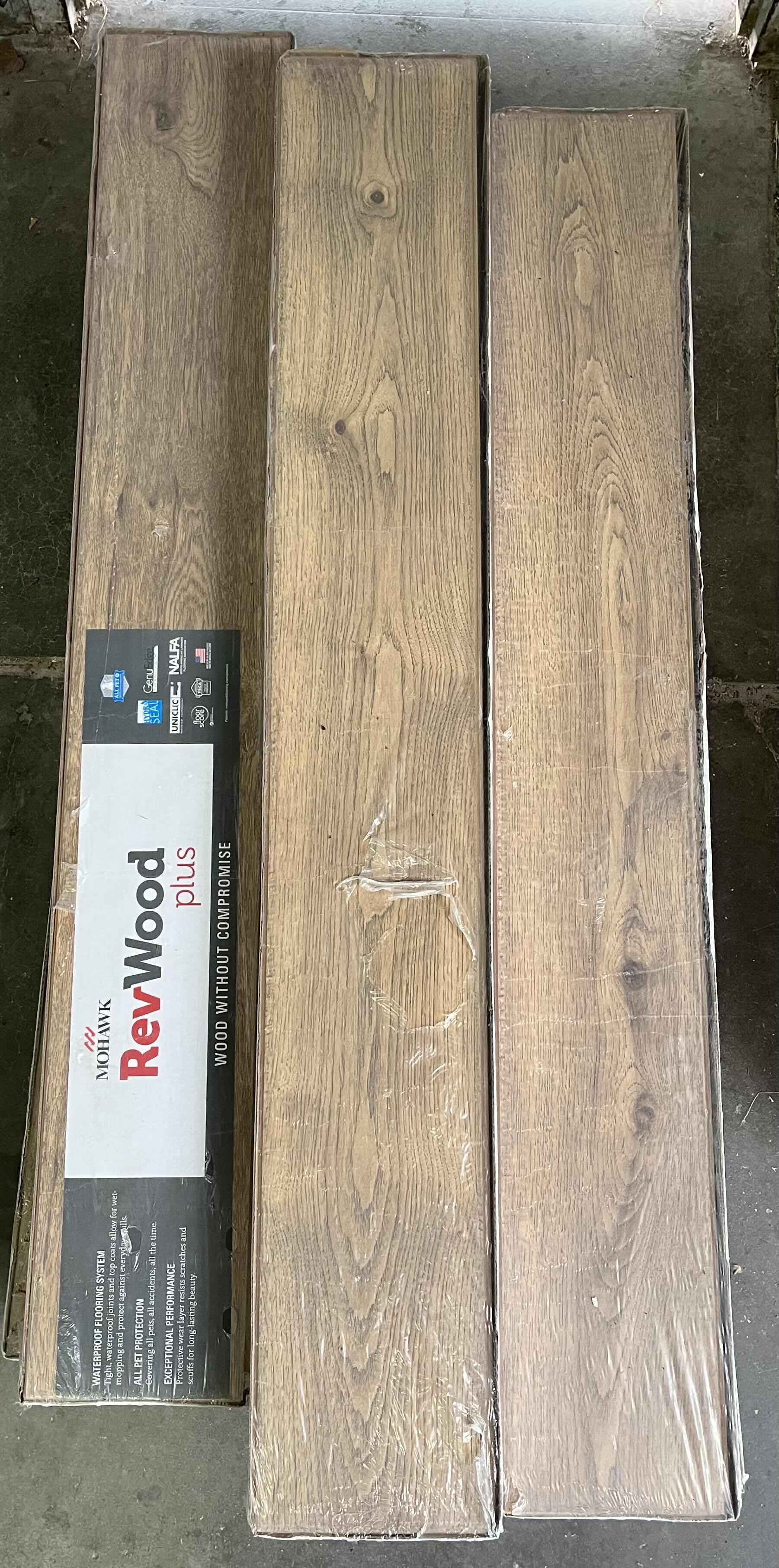 Photo 1 of MOHAWK REV WOOD PLUS SANDBANK OAK FINISH GLUE DOWN WOOD LAMINATE PLANK FLOORING 7.48” X 54.33” (16.93sqft PER CASE/10CASES APPROX 169.3sqft TOTAL)