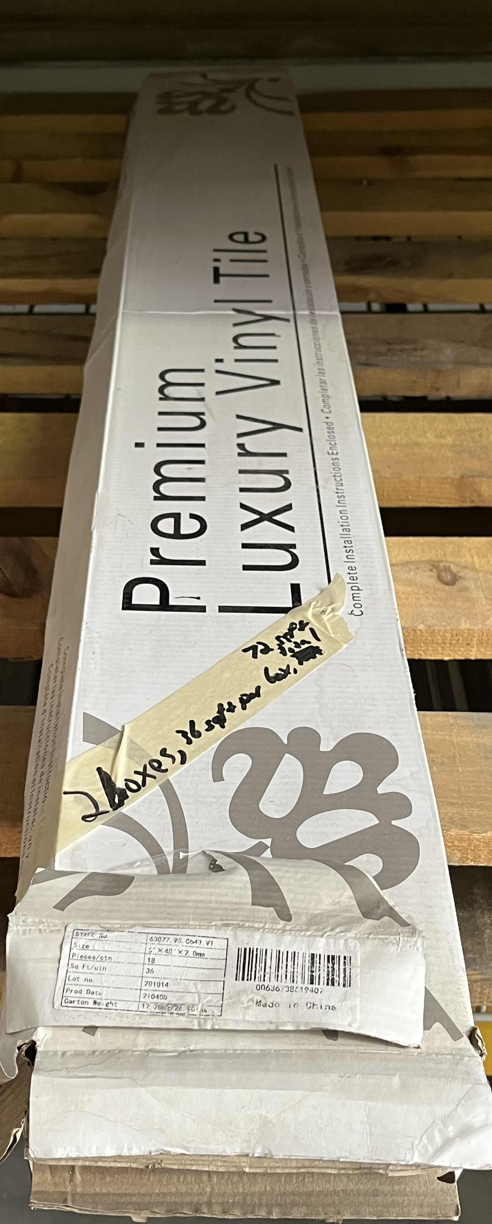 Photo 1 of PREMIUM LUXURY VINYL TILE GRAY WOODGRAIN FINISH GLUE DOWN VINYL PLANK FLOORING 5” X 48” (36SQFT PER CASE/2CASES APPROX. 72SQFT TOTAL) READ NOTES