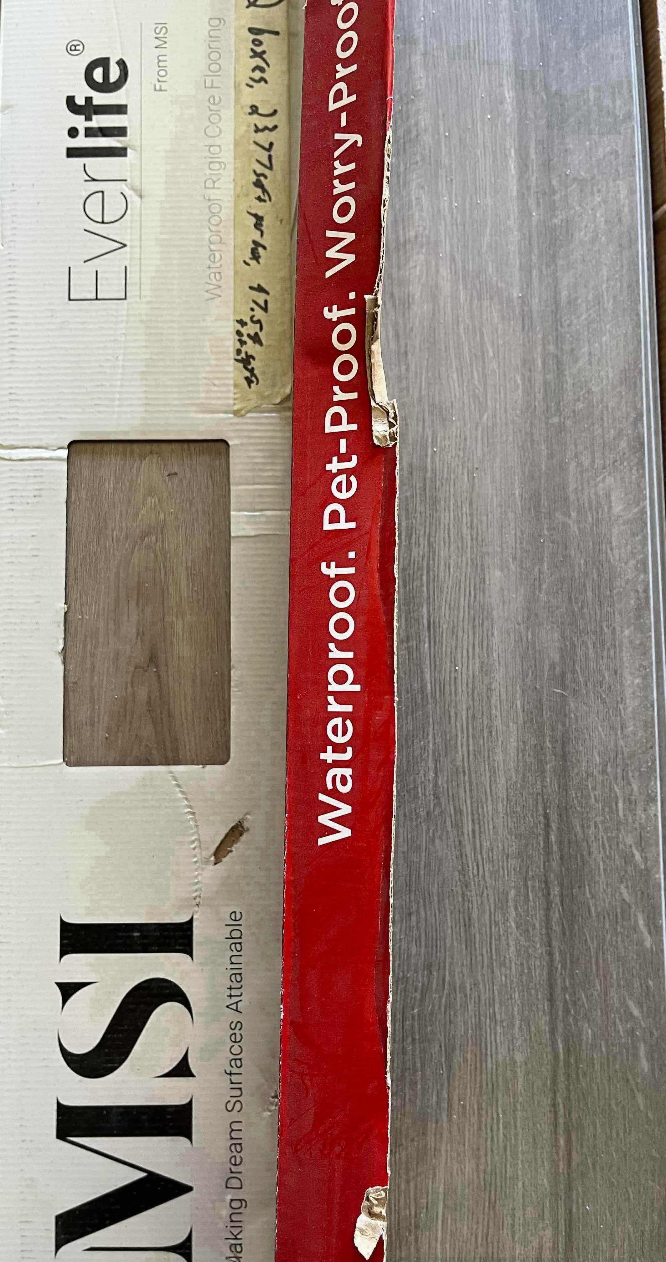 Photo 1 of MIXED FLOORING PALLET-GLUE DOWN/SNAP IN VINYL & HARDWOOD PLANK FLOORING - VARIOUS SIZES & STYLES (READ NOTES)