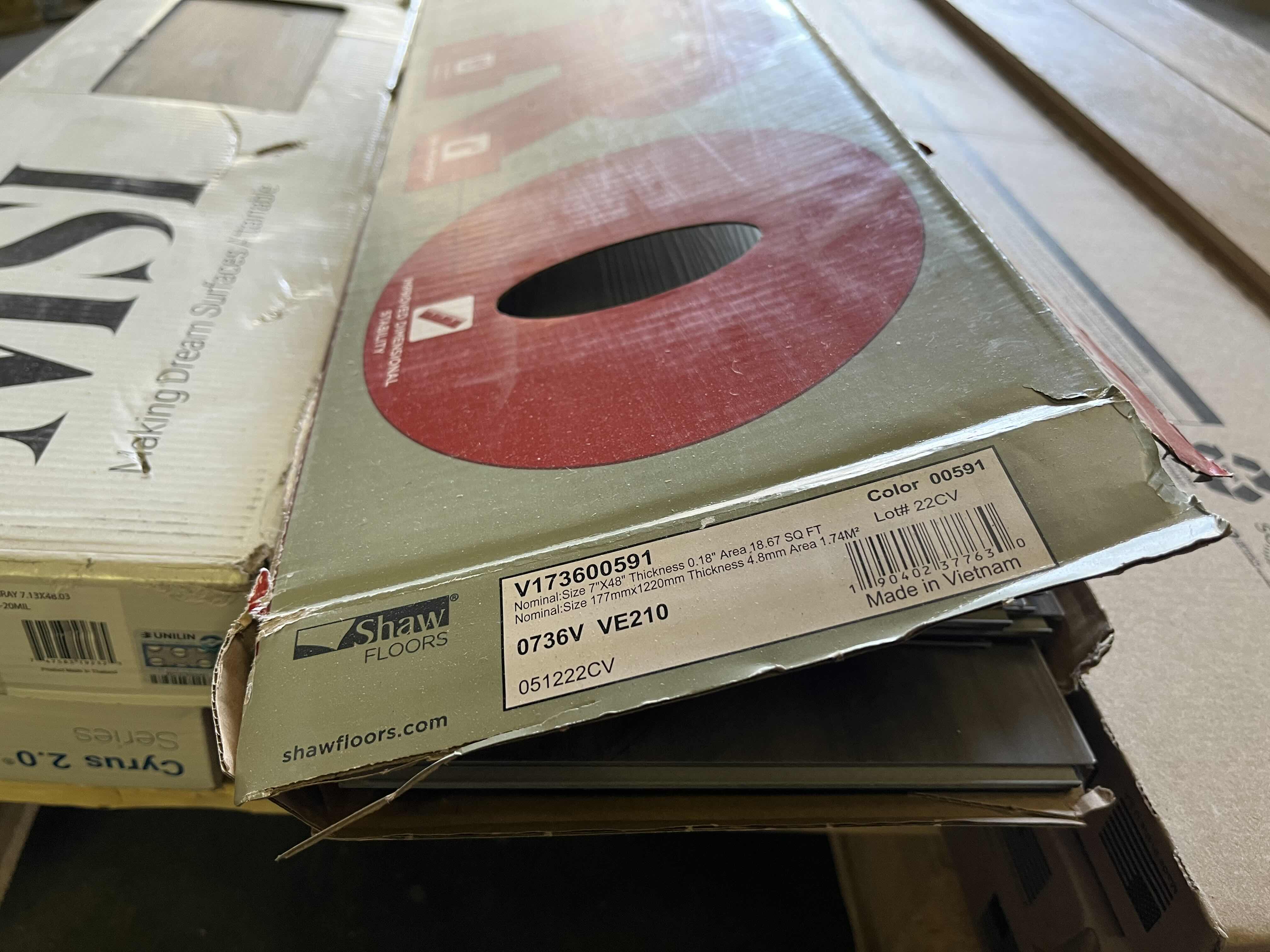 Photo 1 of MIXED FLOORING PALLET-GLUE DOWN/SNAP IN VINYL & HARDWOOD PLANK FLOORING - VARIOUS SIZES & STYLES (READ NOTES)