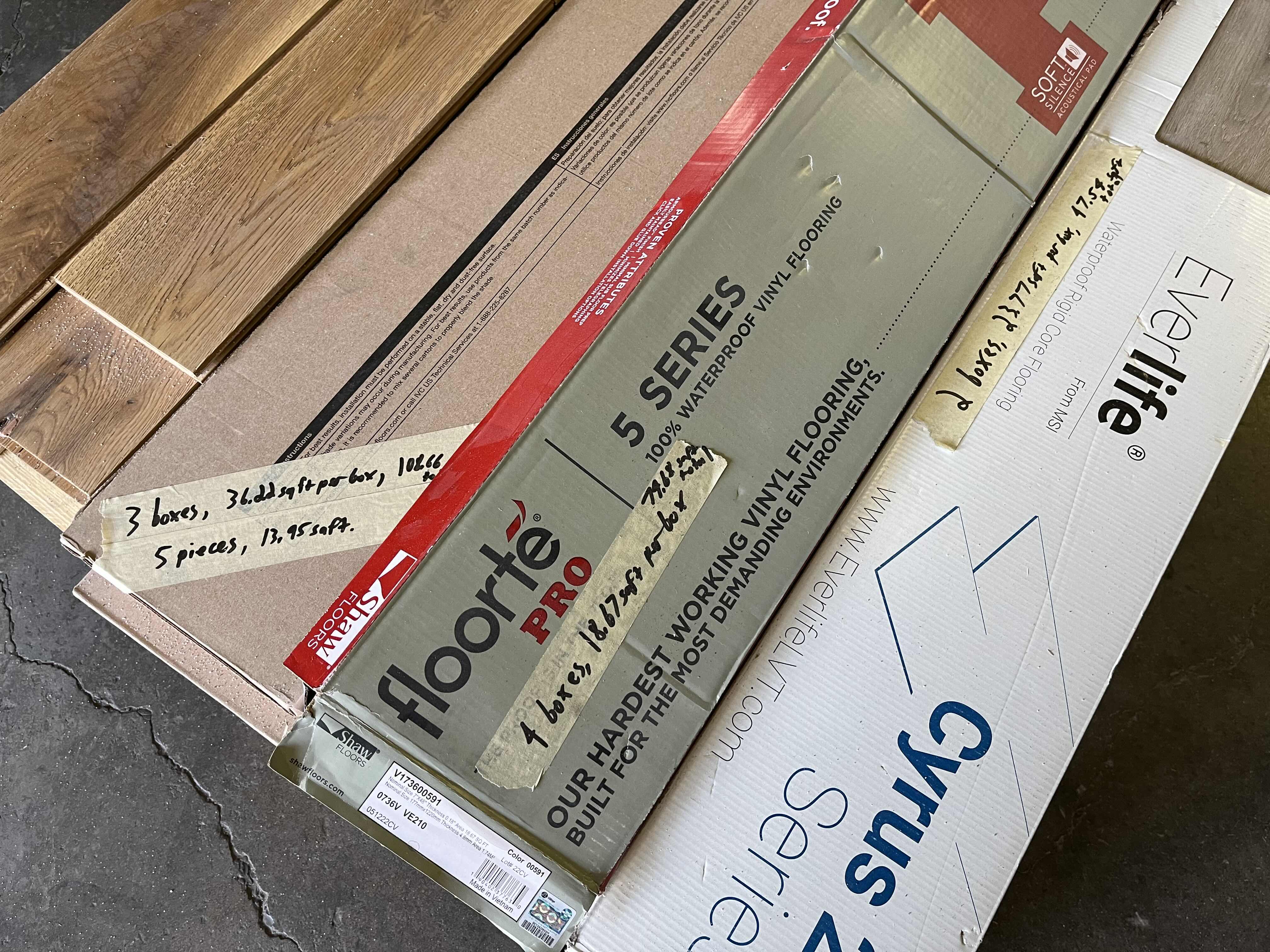 Photo 1 of MIXED FLOORING PALLET-GLUE DOWN/SNAP IN VINYL & HARDWOOD PLANK FLOORING - VARIOUS SIZES & STYLES (READ NOTES)