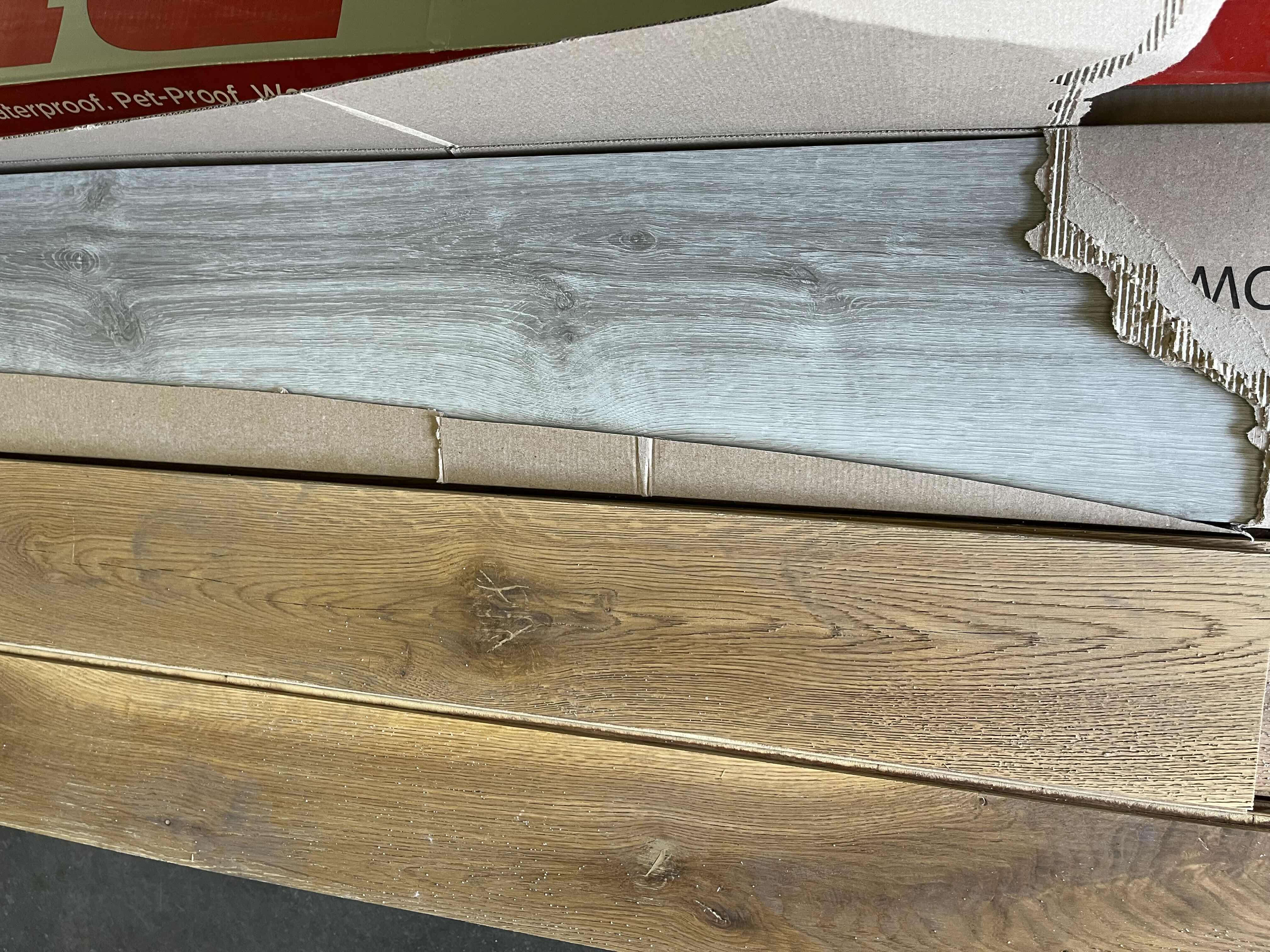 Photo 1 of MIXED FLOORING PALLET-GLUE DOWN/SNAP IN VINYL & HARDWOOD PLANK FLOORING - VARIOUS SIZES & STYLES (READ NOTES)