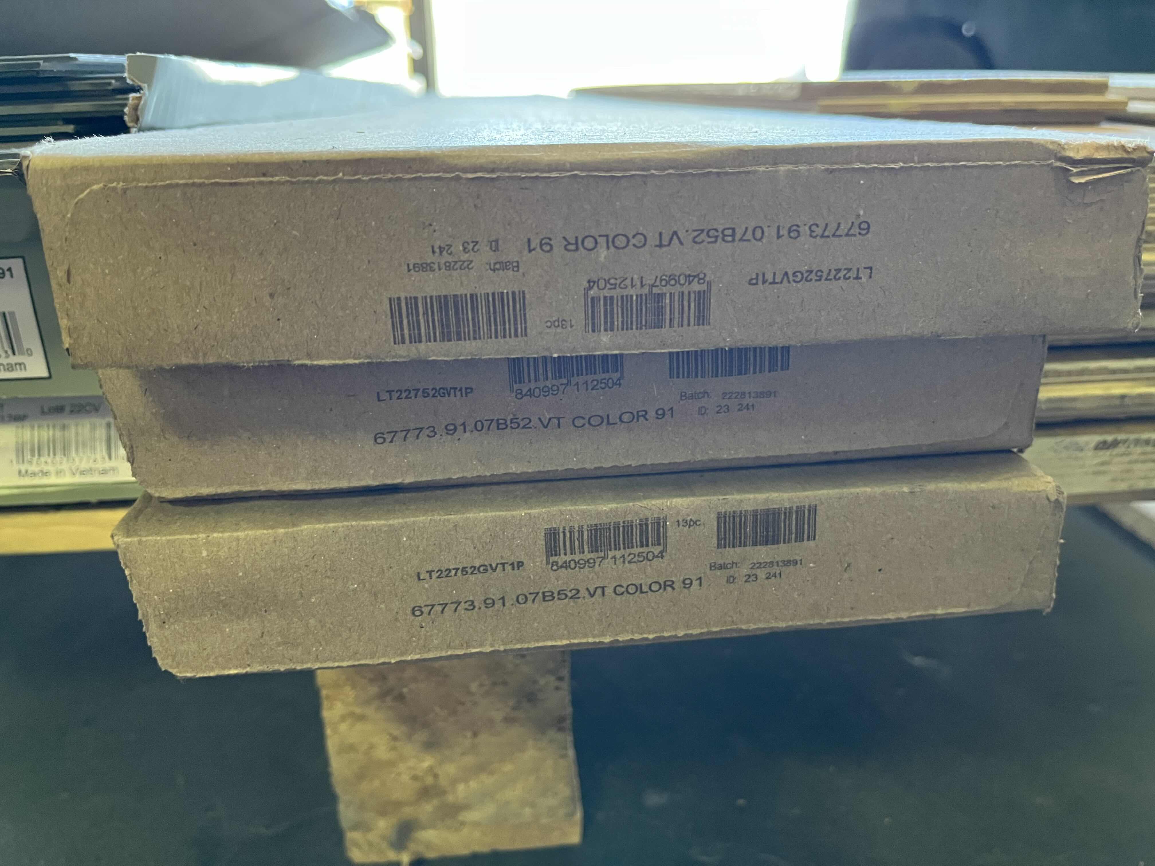 Photo 1 of MIXED FLOORING PALLET-GLUE DOWN/SNAP IN VINYL & HARDWOOD PLANK FLOORING - VARIOUS SIZES & STYLES (READ NOTES)