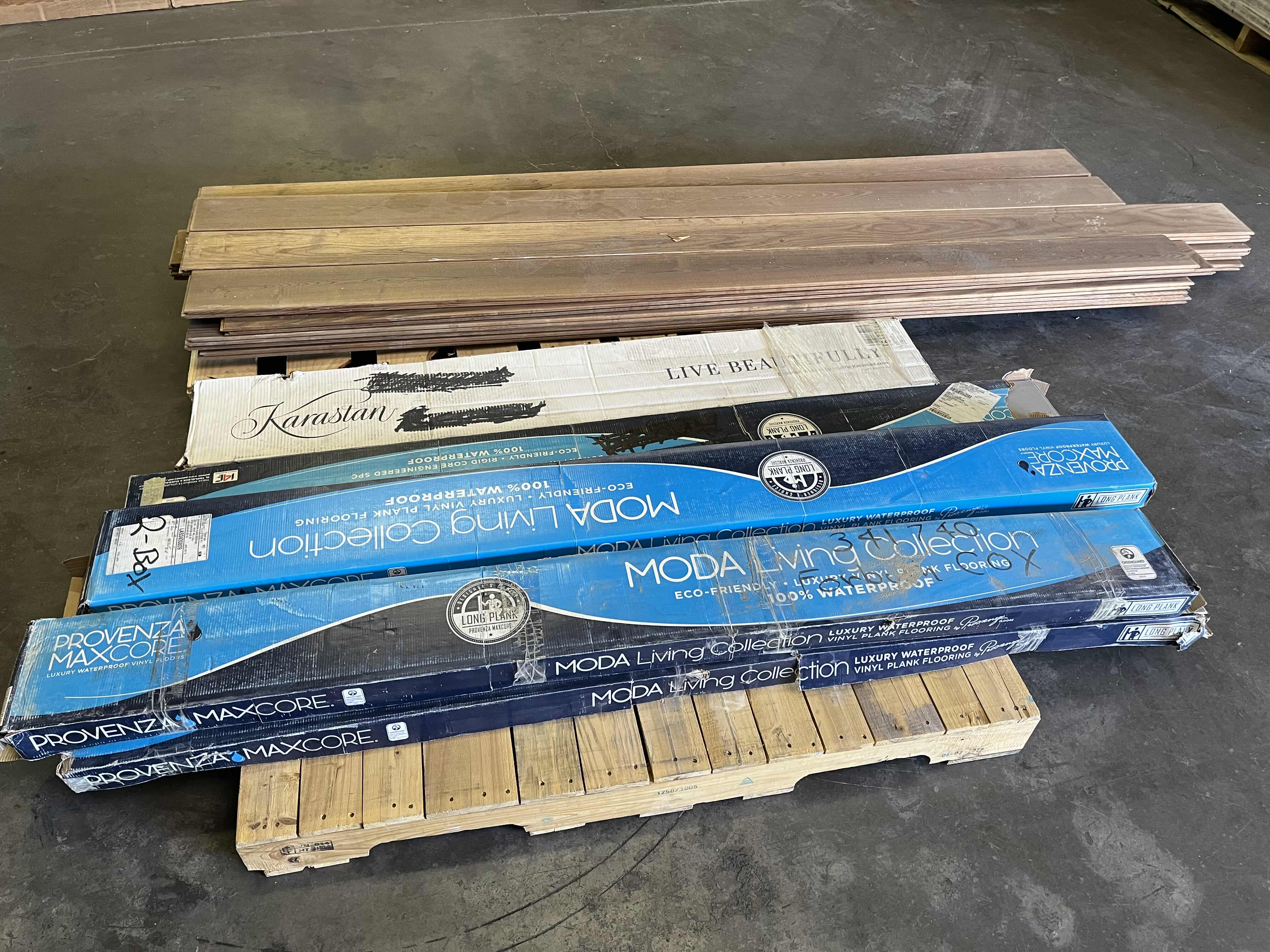 Photo 1 of MIXED FLOORING PALLET-GLUE DOWN/SNAP IN VINYL & HARDWOOD PLANK FLOORING - VARIOUS SIZES & STYLES (READ NOTES)