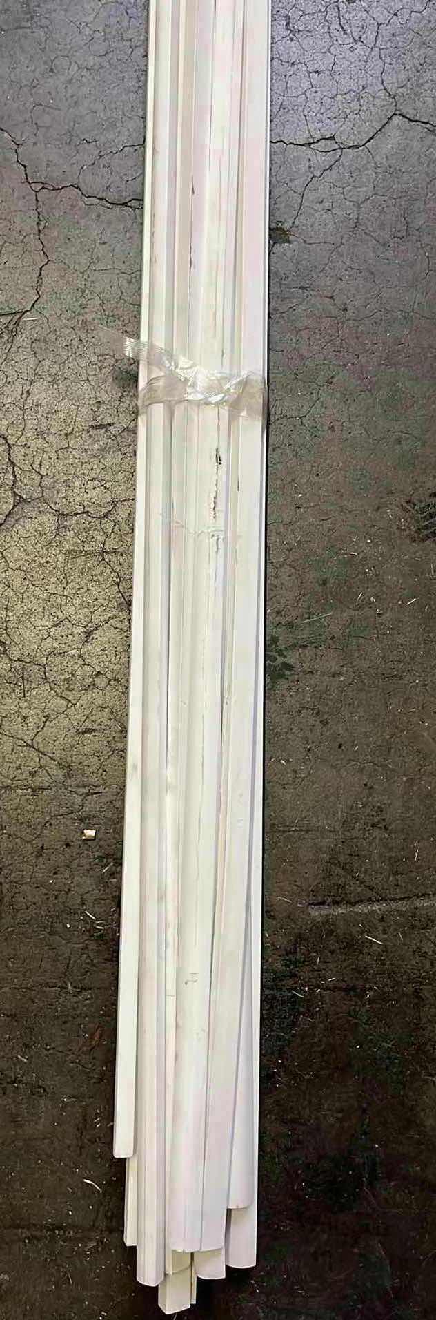 Photo 1 of WHITE WOOD FINISH QUARTER ROUND MOLDING (15PCS) APPROX. 15’-16’