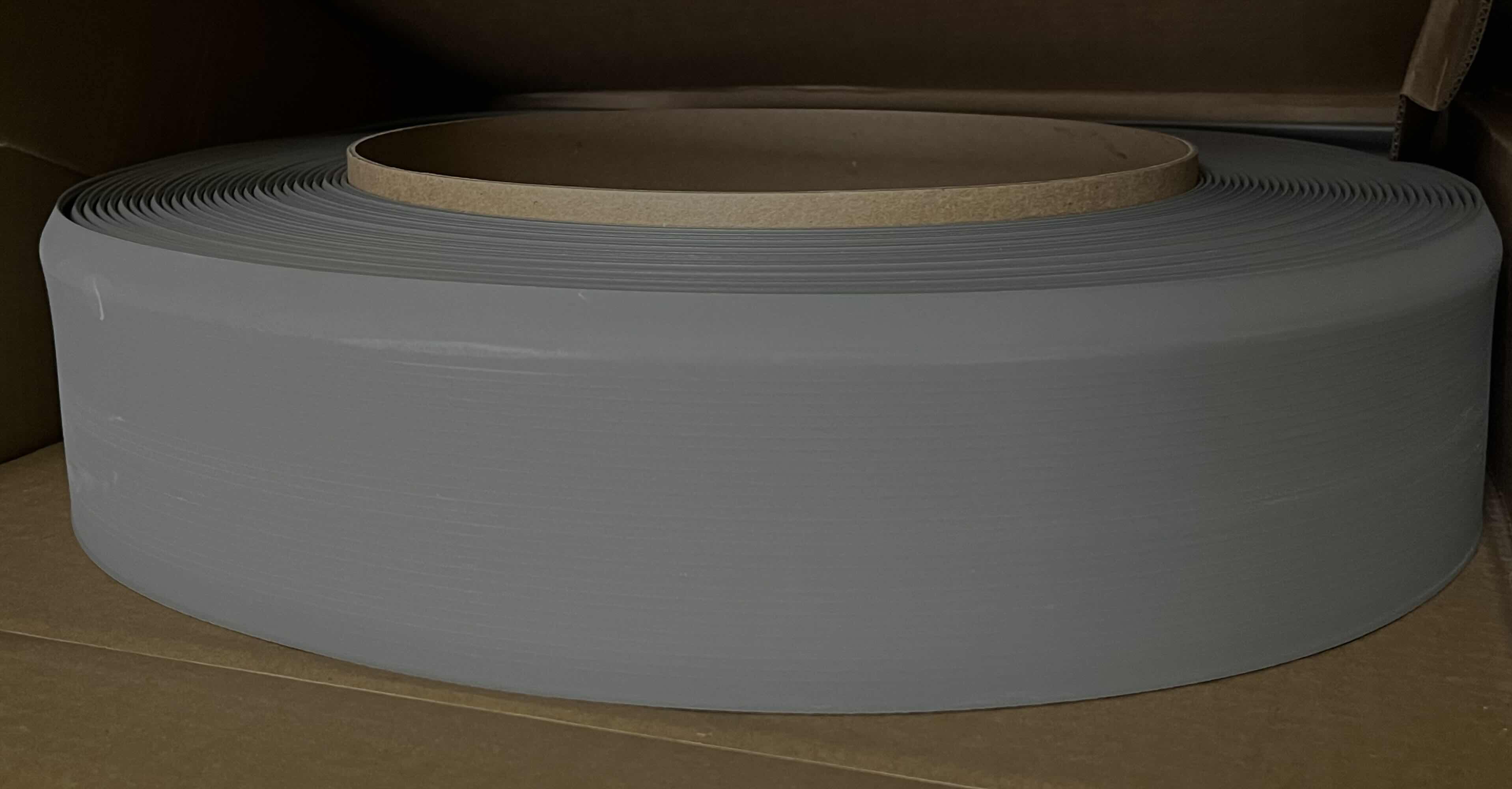 Photo 1 of MOHAWK LIGHT GRAY FINISH WALL COVE BASE ROLL 4” X 1/8” X 120’