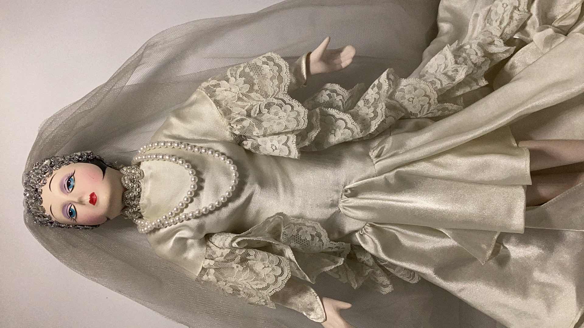 Photo 1 of COLLECTIBLE PORCELAIN DOLL H17”