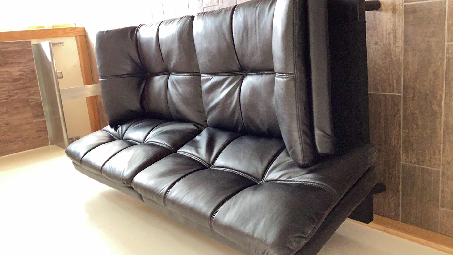 Photo 1 of BLACK LEATHER LOVE SEAT