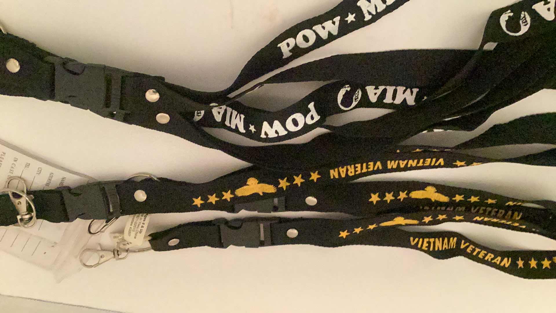 Photo 1 of LANYARDS VIETNAM AND POW MIA 3+3
