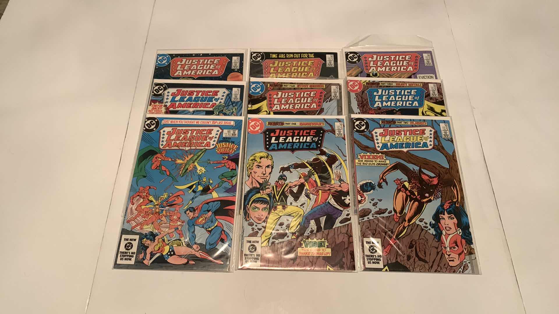 Photo 1 of 9- JUSTICE LEAGUE COMICS