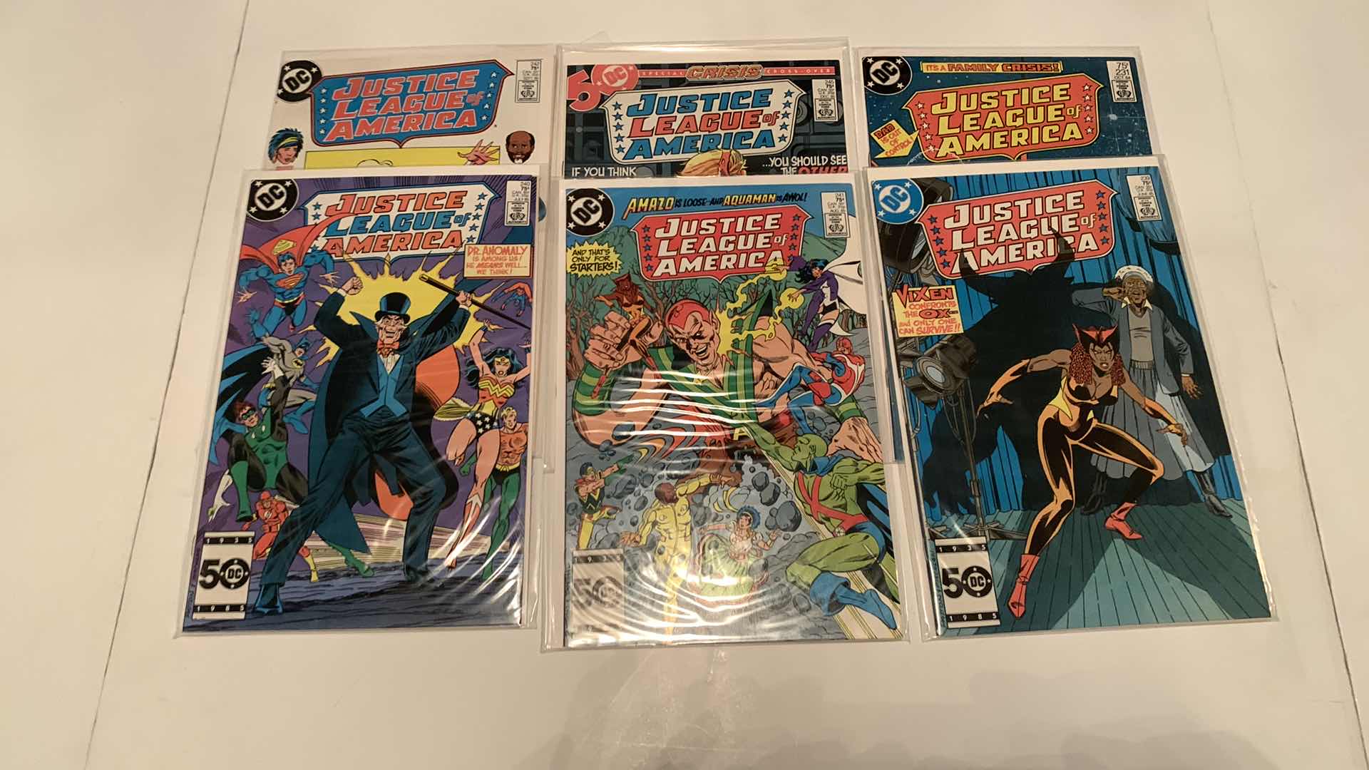 Photo 2 of 9- JUSTICE LEAGUE COMICS