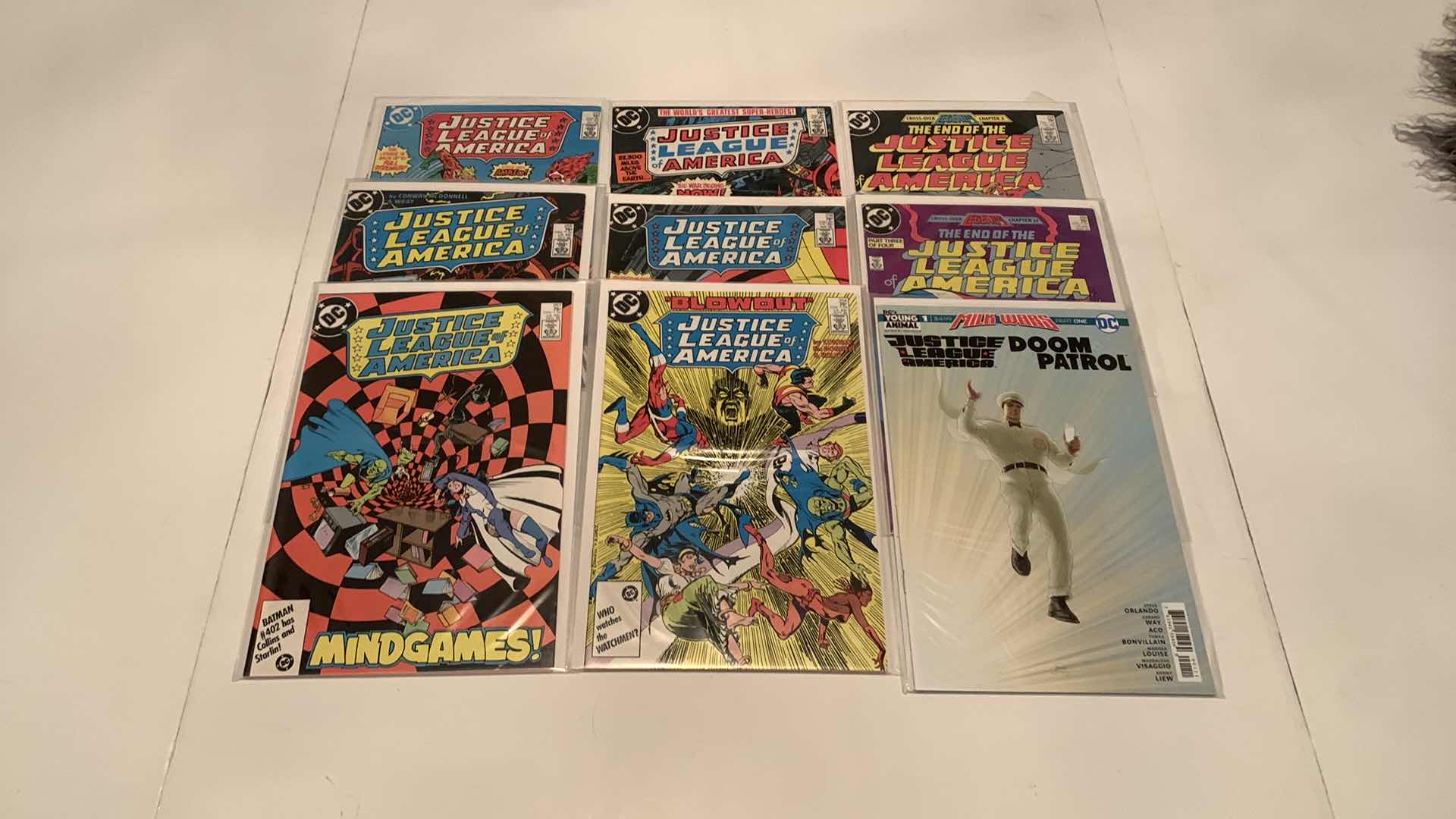 Photo 1 of 9- JUSTICE LEAGUE COMICS