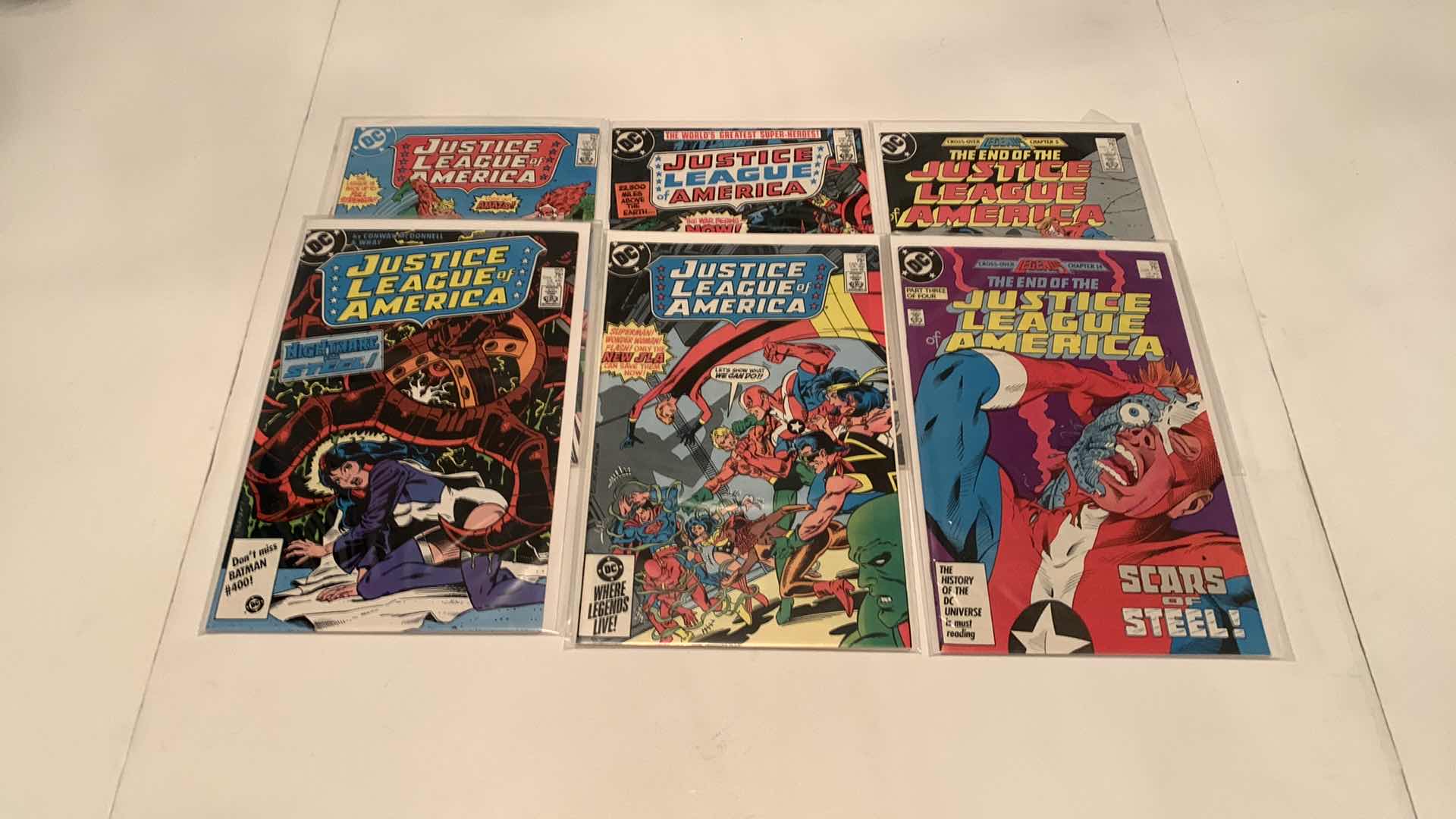 Photo 2 of 9- JUSTICE LEAGUE COMICS