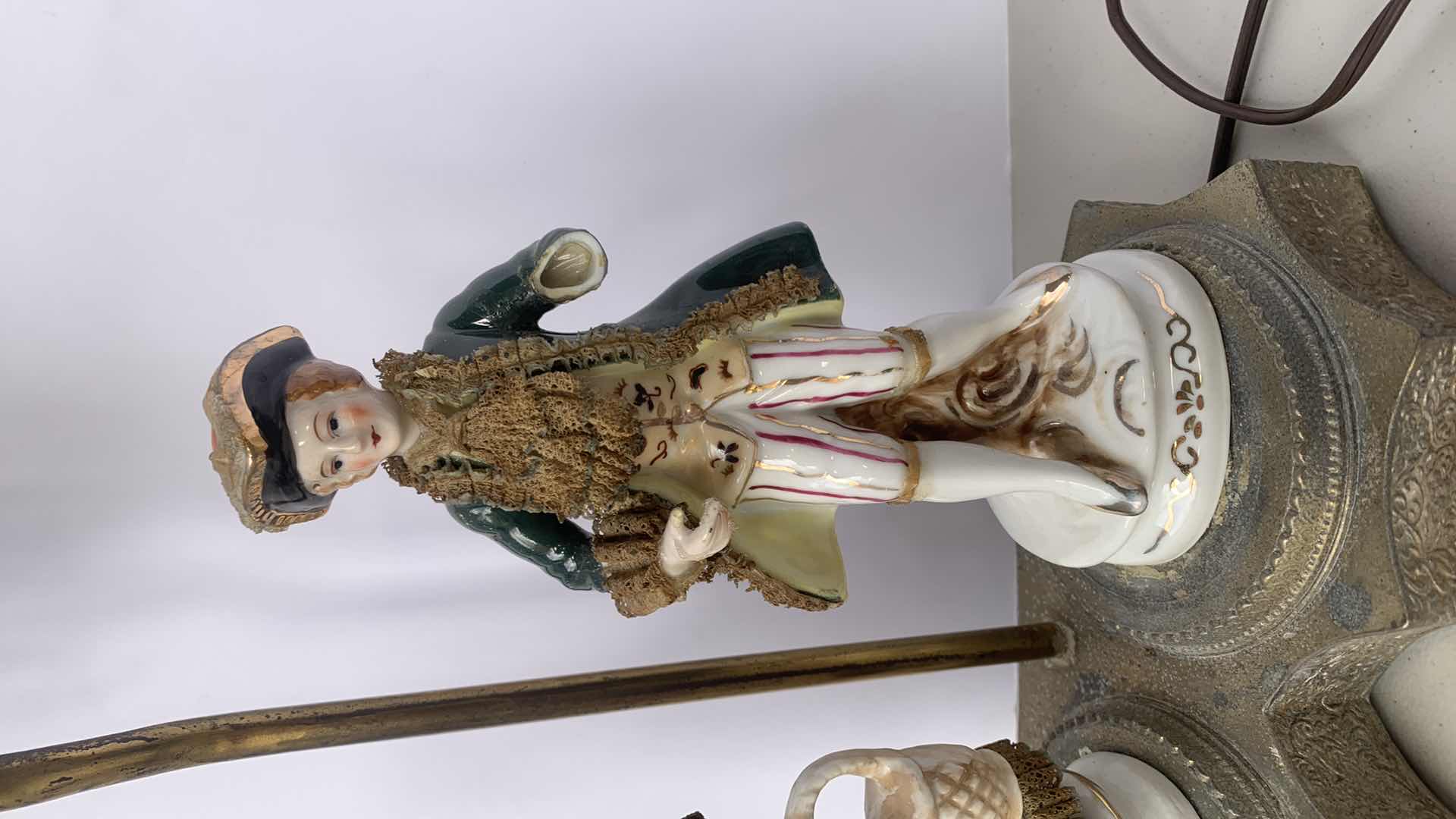 Photo 1 of ANTIQUE HANDPAINTED PORCELAIN FIGURINE ON ETCHED METAL BASE LAMP FIXTURE, H 22”