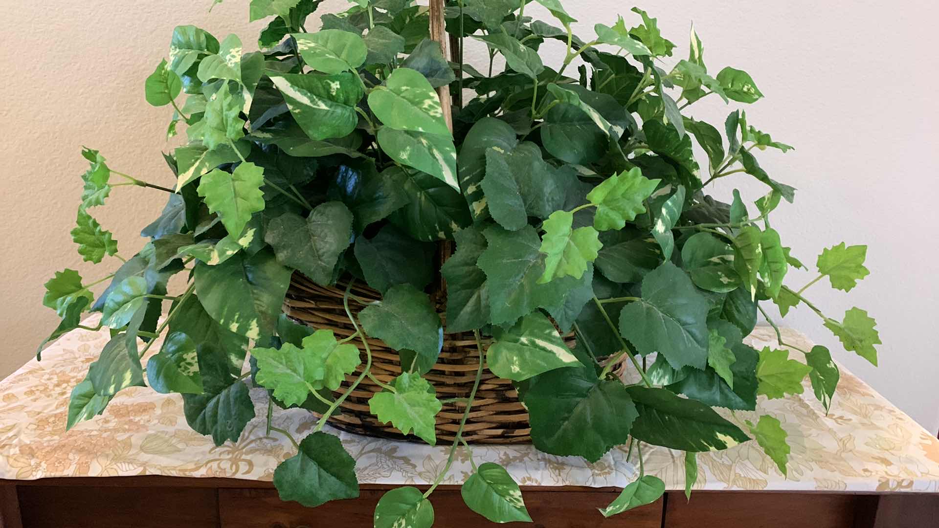 Photo 1 of HOME DECOR, TWO LARGE WICKER BASKETS WITH FAUX GREENERY 29” x H19”