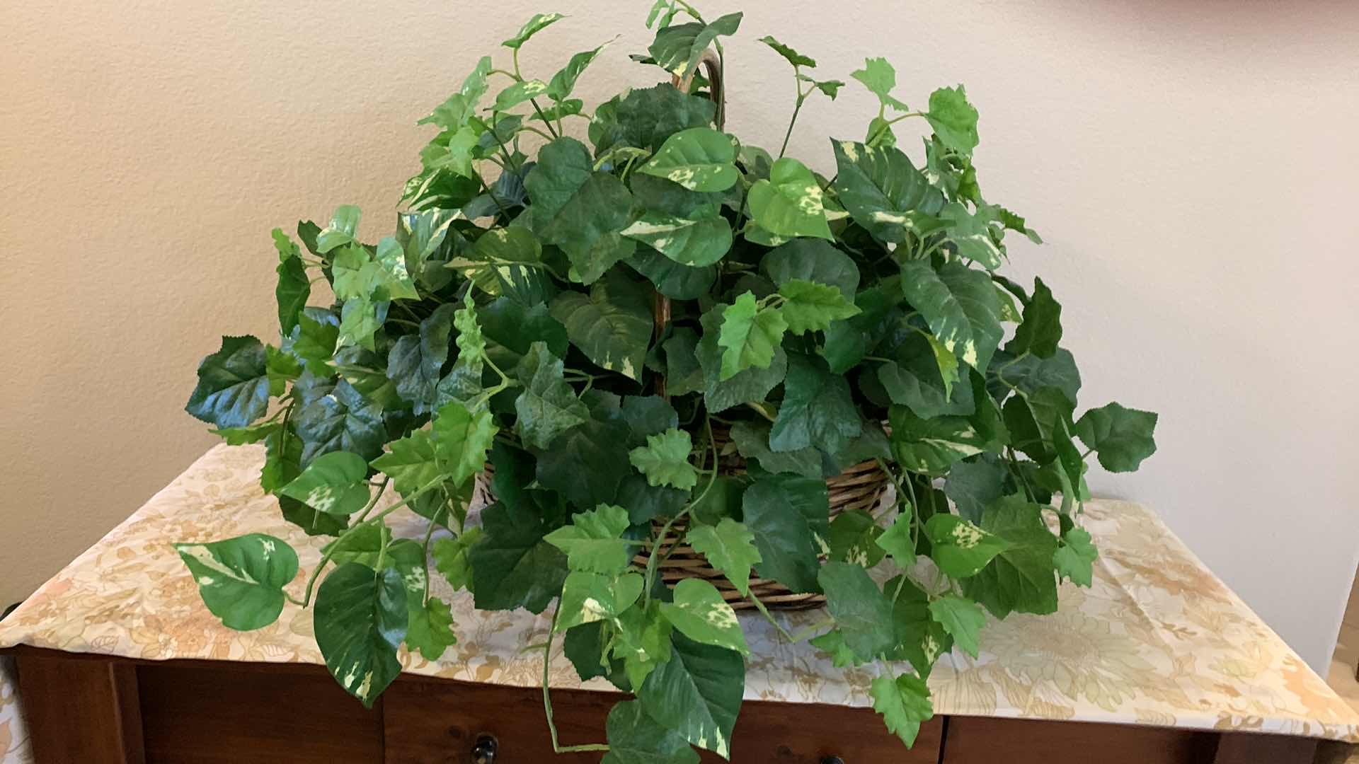 Photo 1 of HOME DECOR, TWO LARGE WICKER BASKETS WITH FAUX GREENERY 29” x H19”