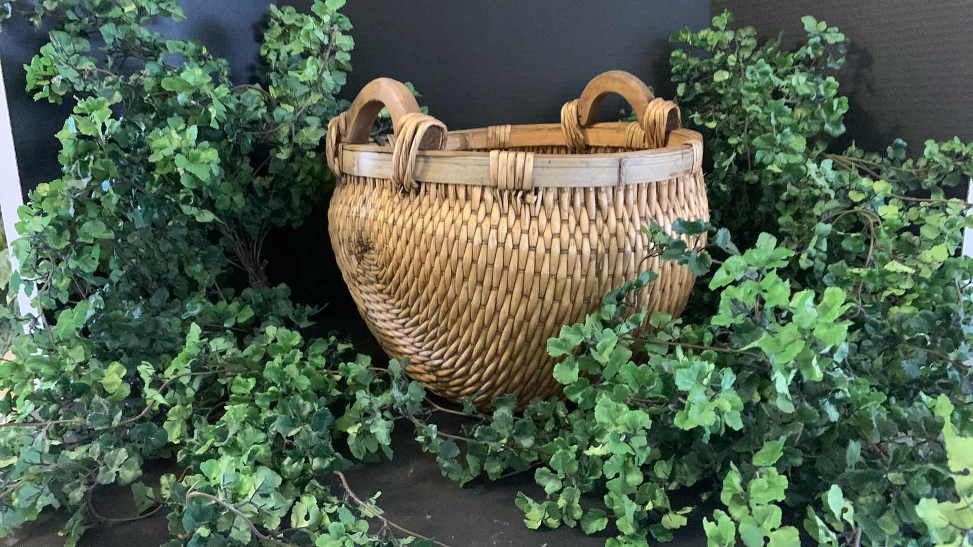 Photo 1 of RATAN WOVEN BASKET 15” x H14” w FAUX GREENERY