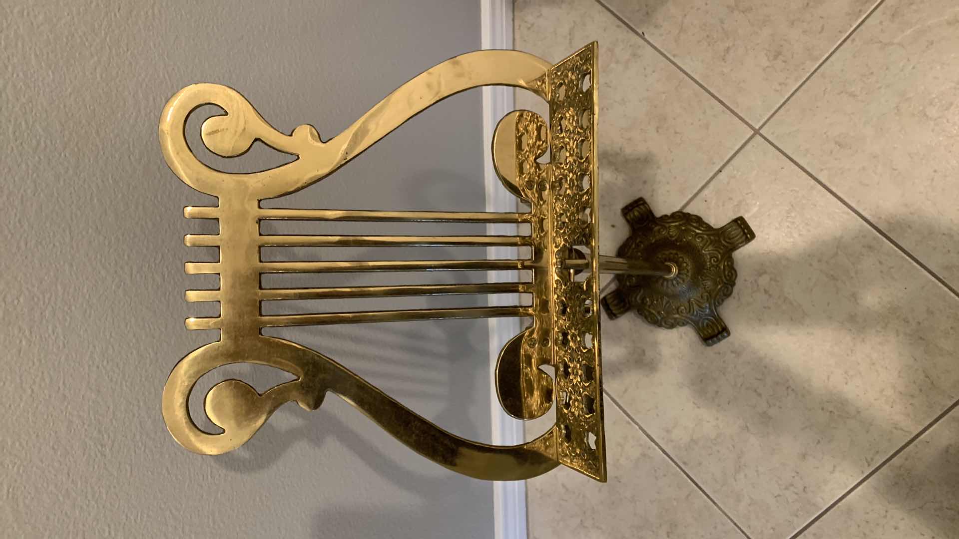 Photo 1 of METAL MUSIC STAND W VINTAGE BOOK