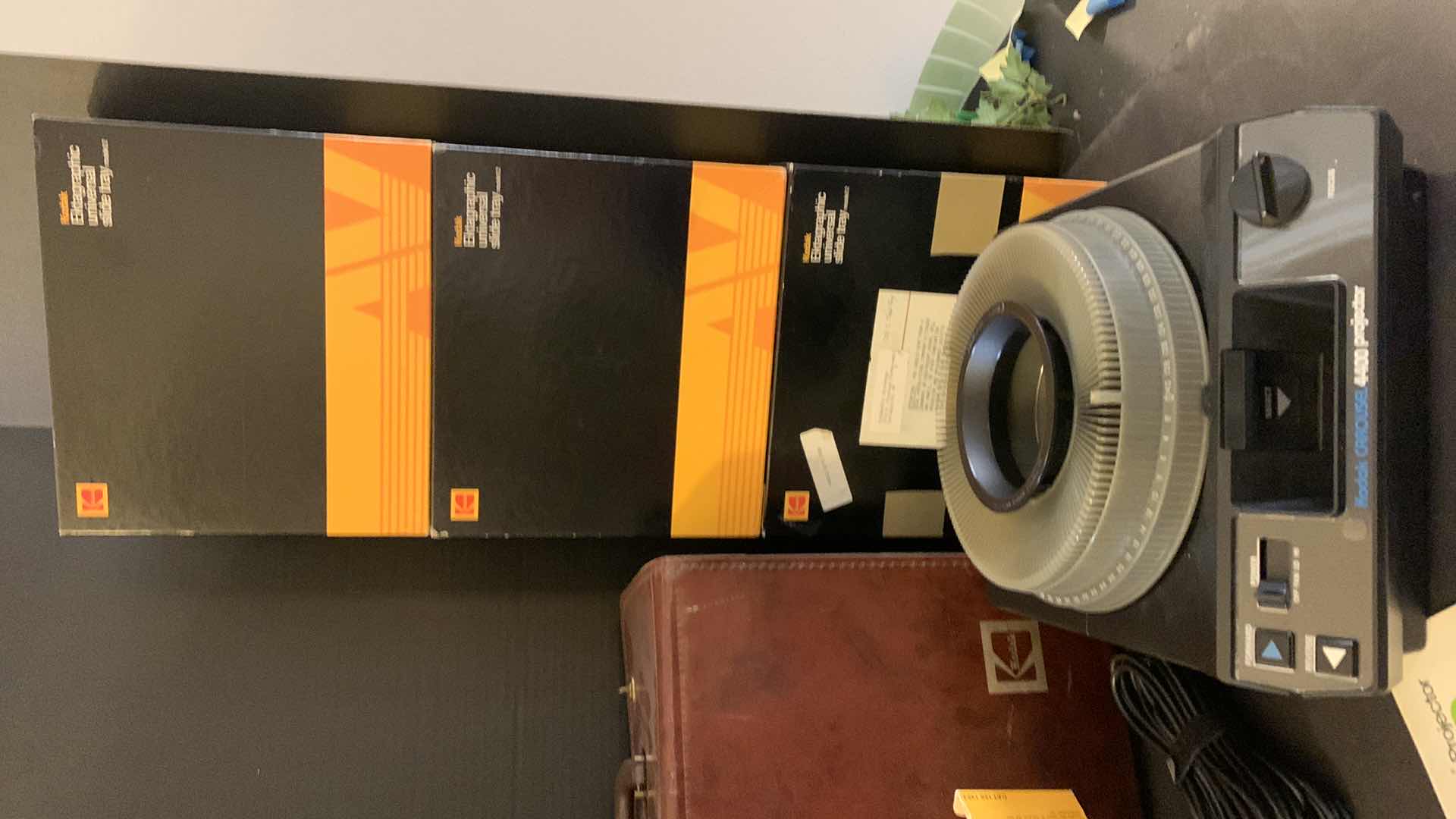 Photo 1 of KODAK CAROUSEL PROJECTOR 4400 IN ORIGINAL LEATHER CASE W ACCESSORIES, 4 BOXES SLIDE TRAYS