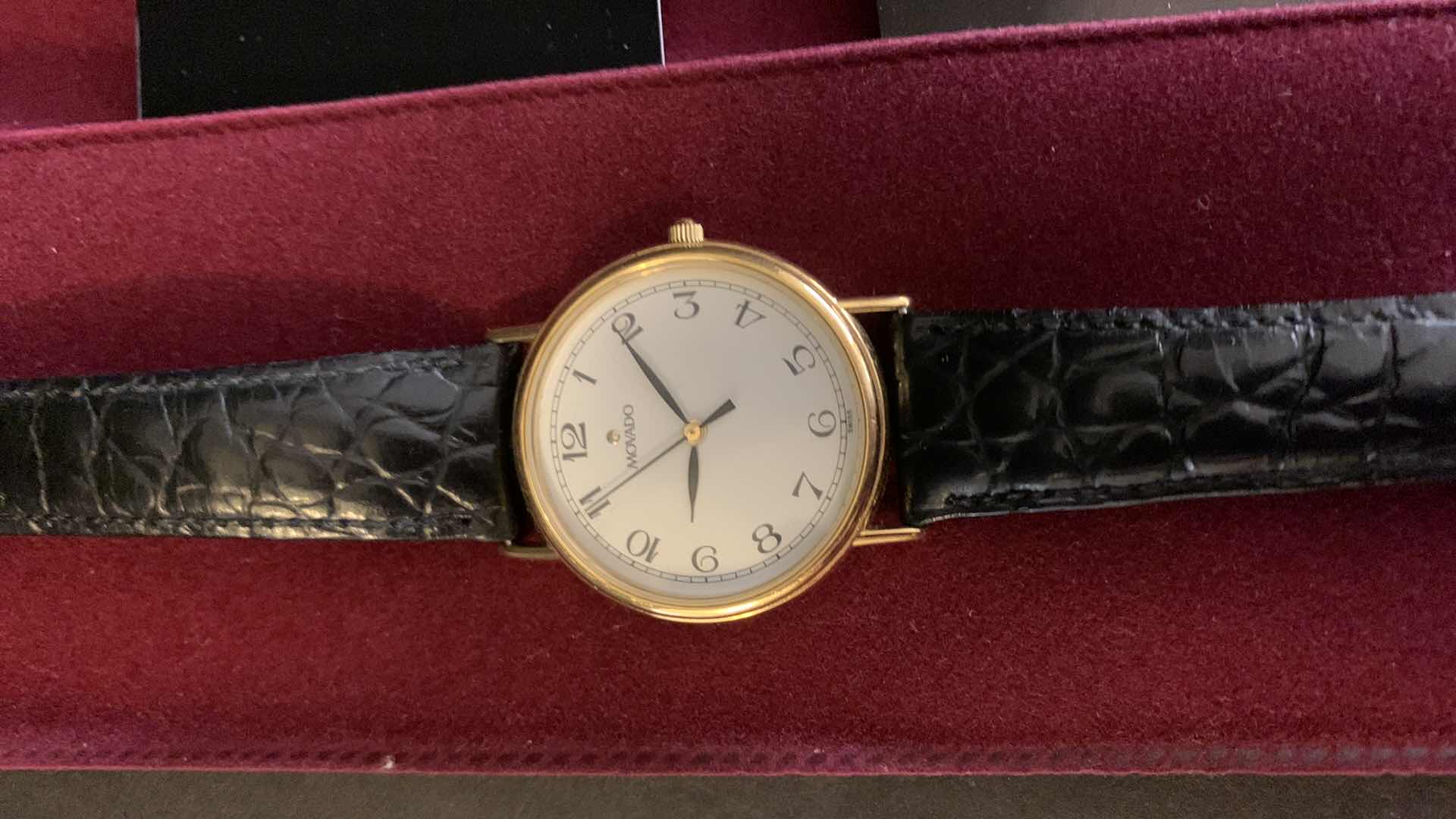 Photo 1 of MENS ESQ MOVADO WATCH WITH LEATHER BAND