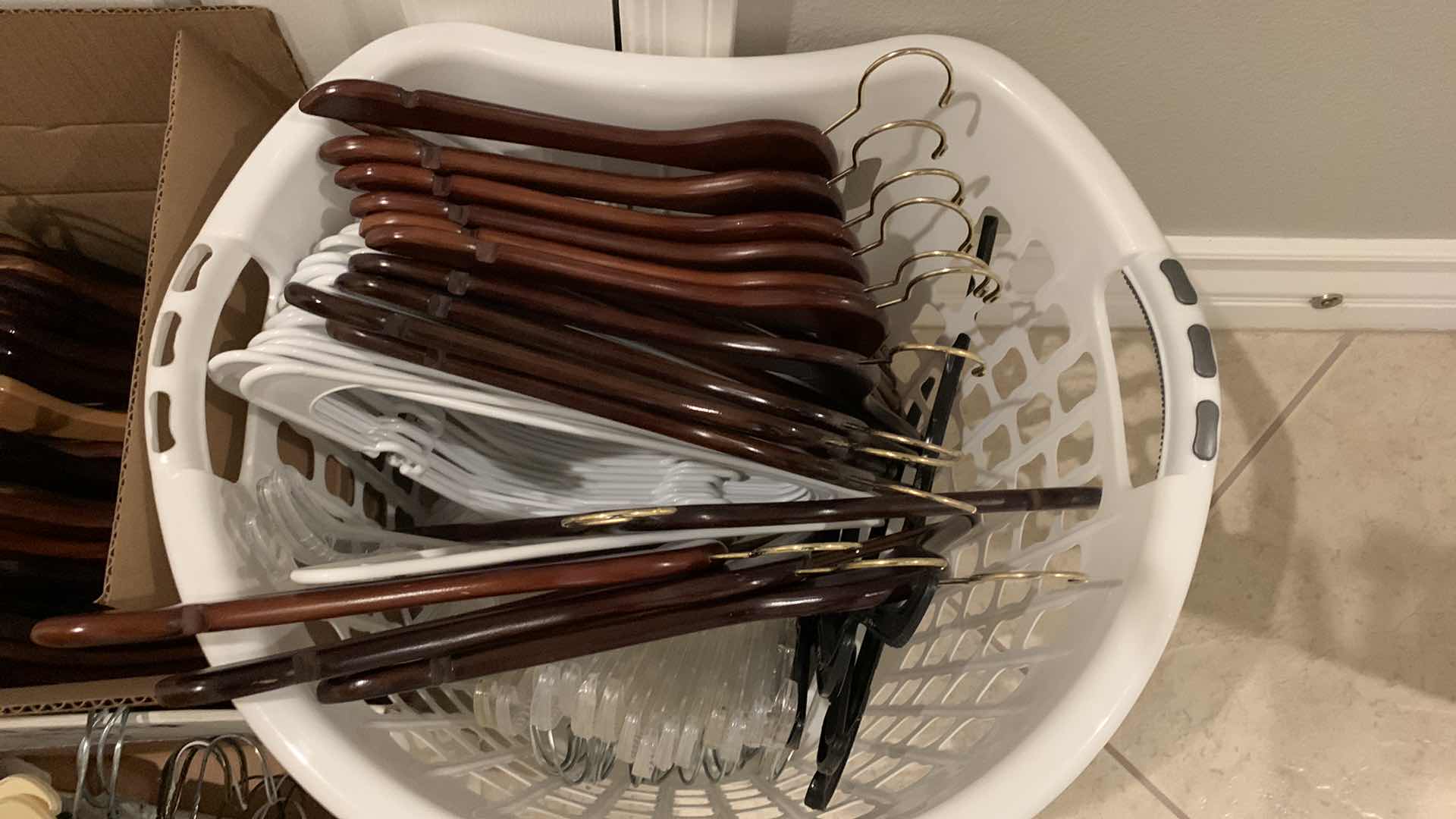 Photo 3 of THREE CONTAINERS OF HANGERS