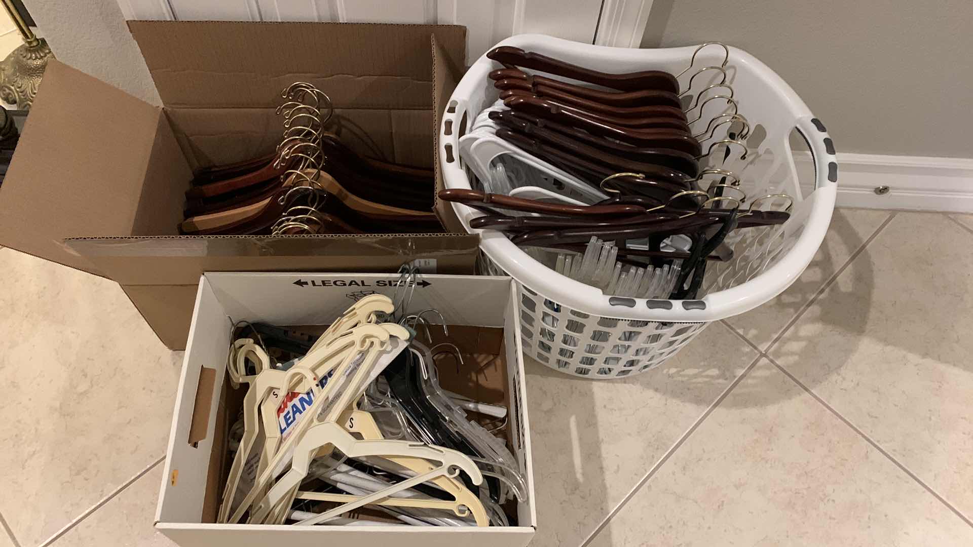 Photo 1 of THREE CONTAINERS OF HANGERS