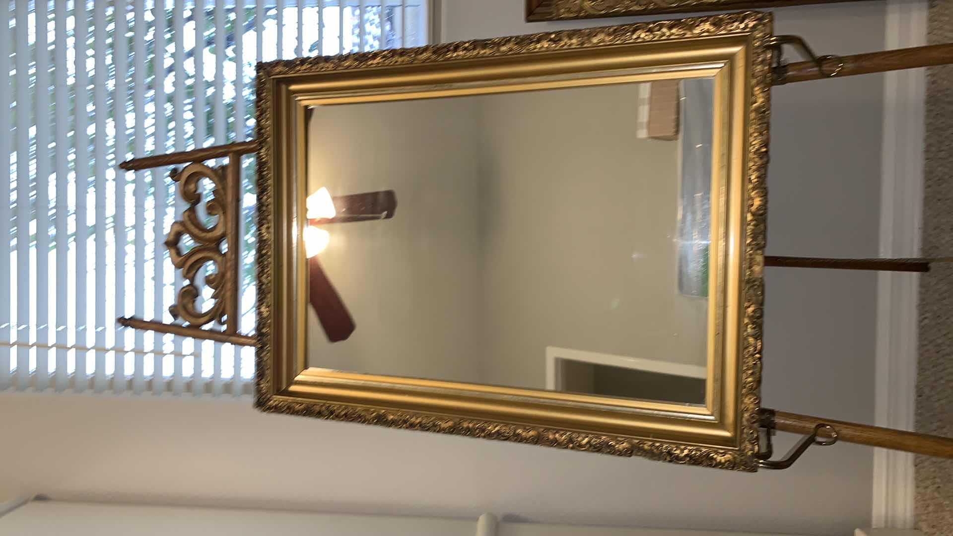 Photo 1 of VINTAGE MIRROR IN ORNATE GOLD FRAME 20.5” x 27.5” (stand not included)