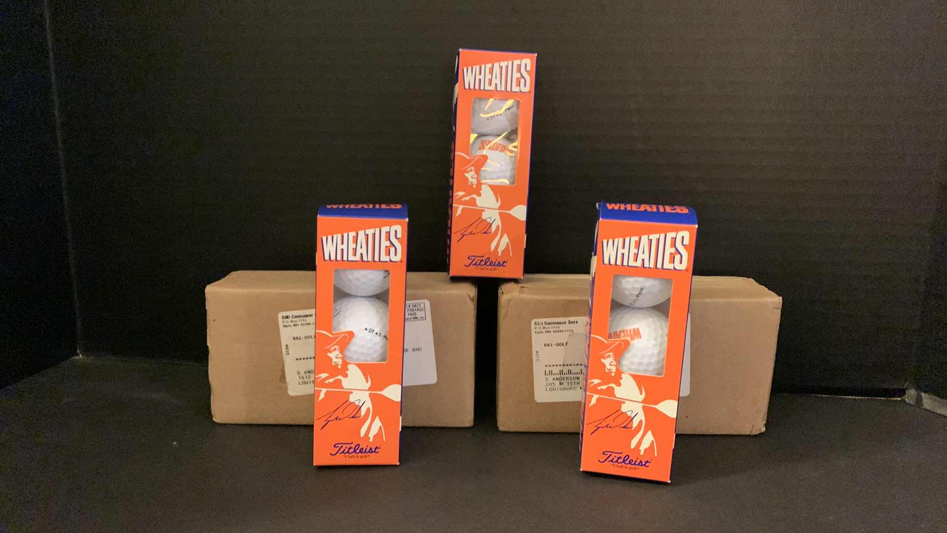 Photo 1 of 5 - THREE GOLF BALL PACKS, TITLEIST, WHEATIES PROMOTIONAL W TIGER WOODS