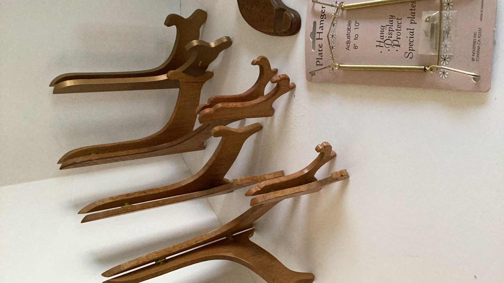 Photo 1 of ASSORTED PLATE STANDS AND HANGERS