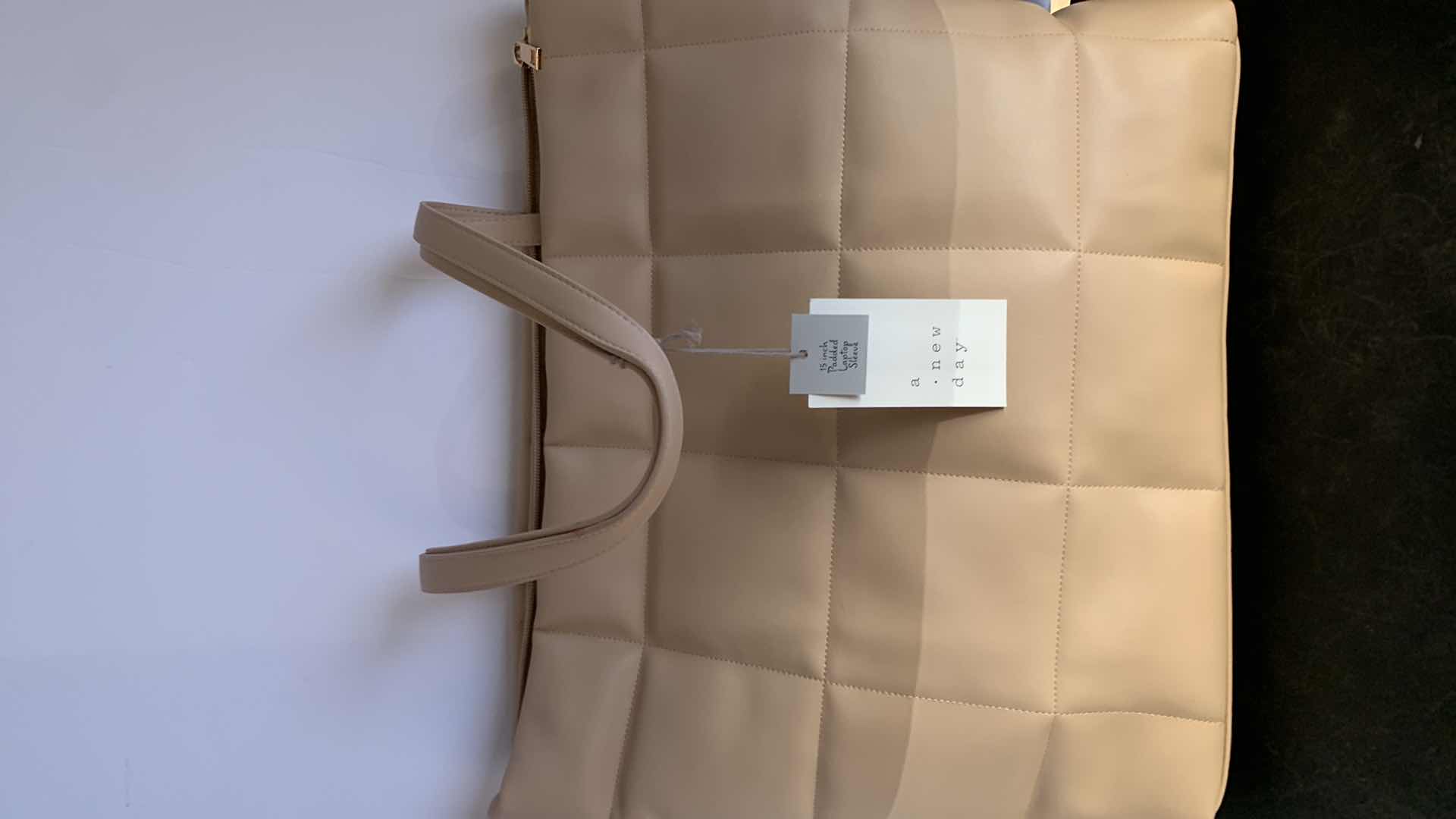 Photo 1 of A NEW DAY, 15 INCH PADDED LAPTOP SLEEVE, TAN $30