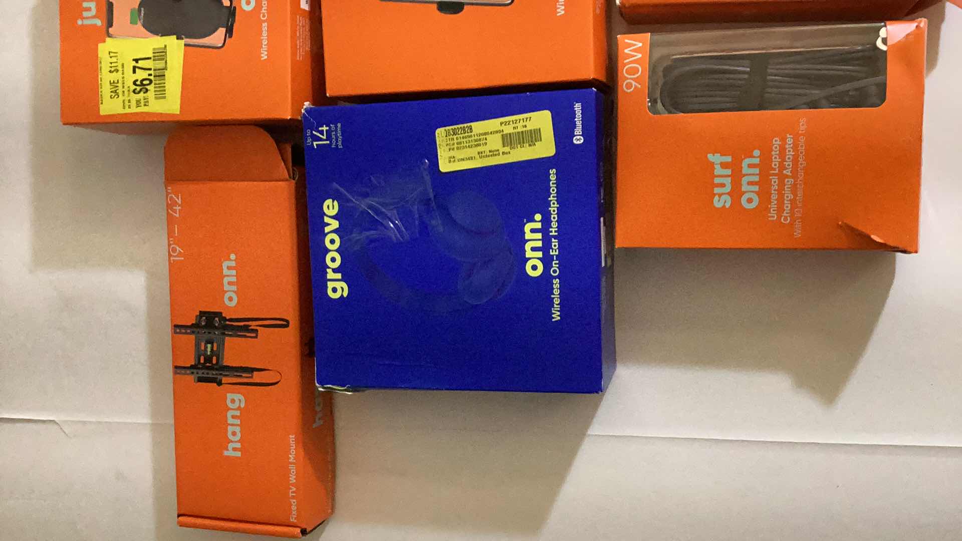 Photo 1 of 8- ASSORTED ELECTRONIC ITEMS: CHARGERS, HEADPHONES, WALL MOUNT