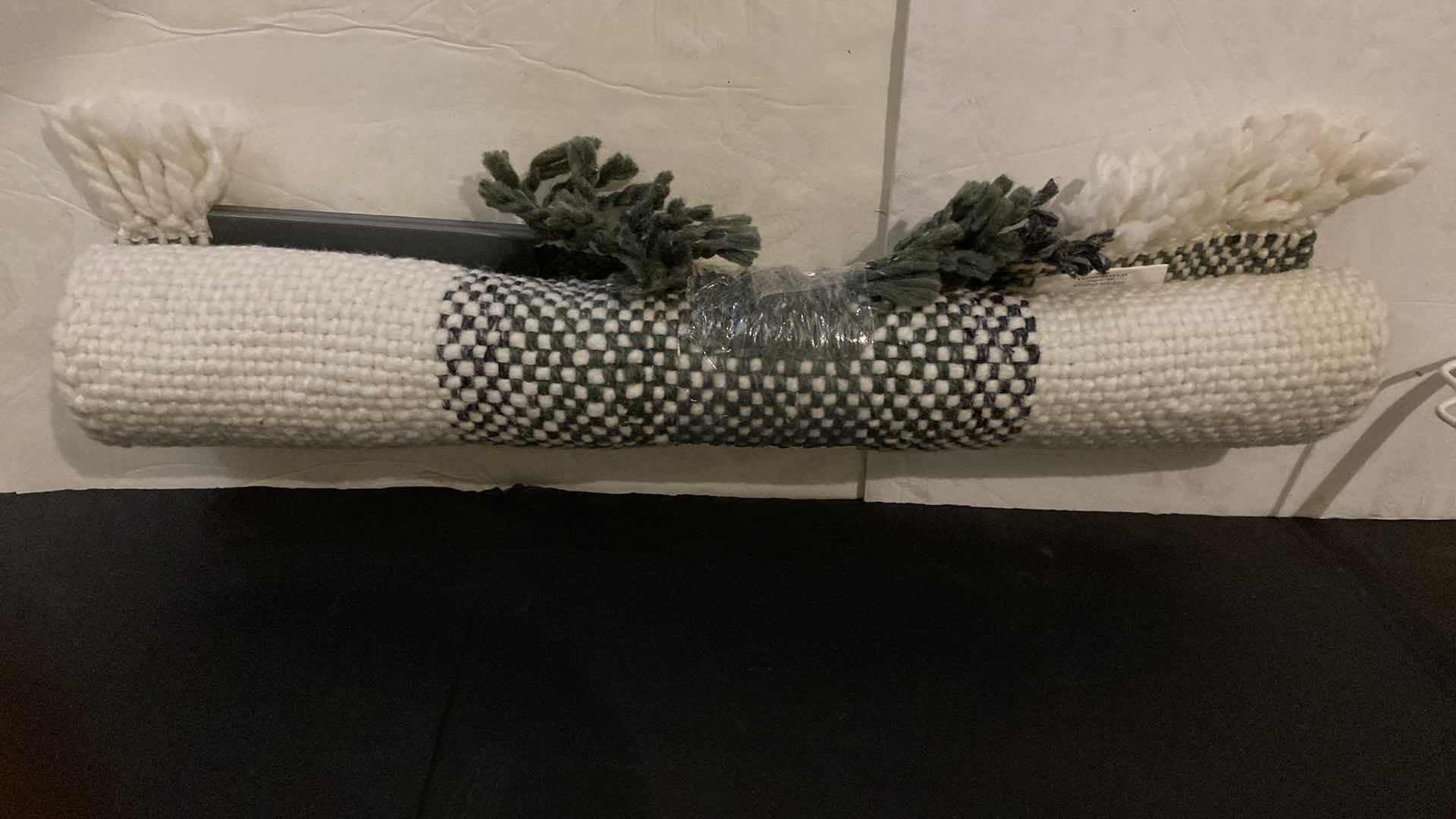 Photo 1 of BRIGHTROOM FOLDABLE DRYING RACK AND GRAY AND WHITE RUG 25” X 38”