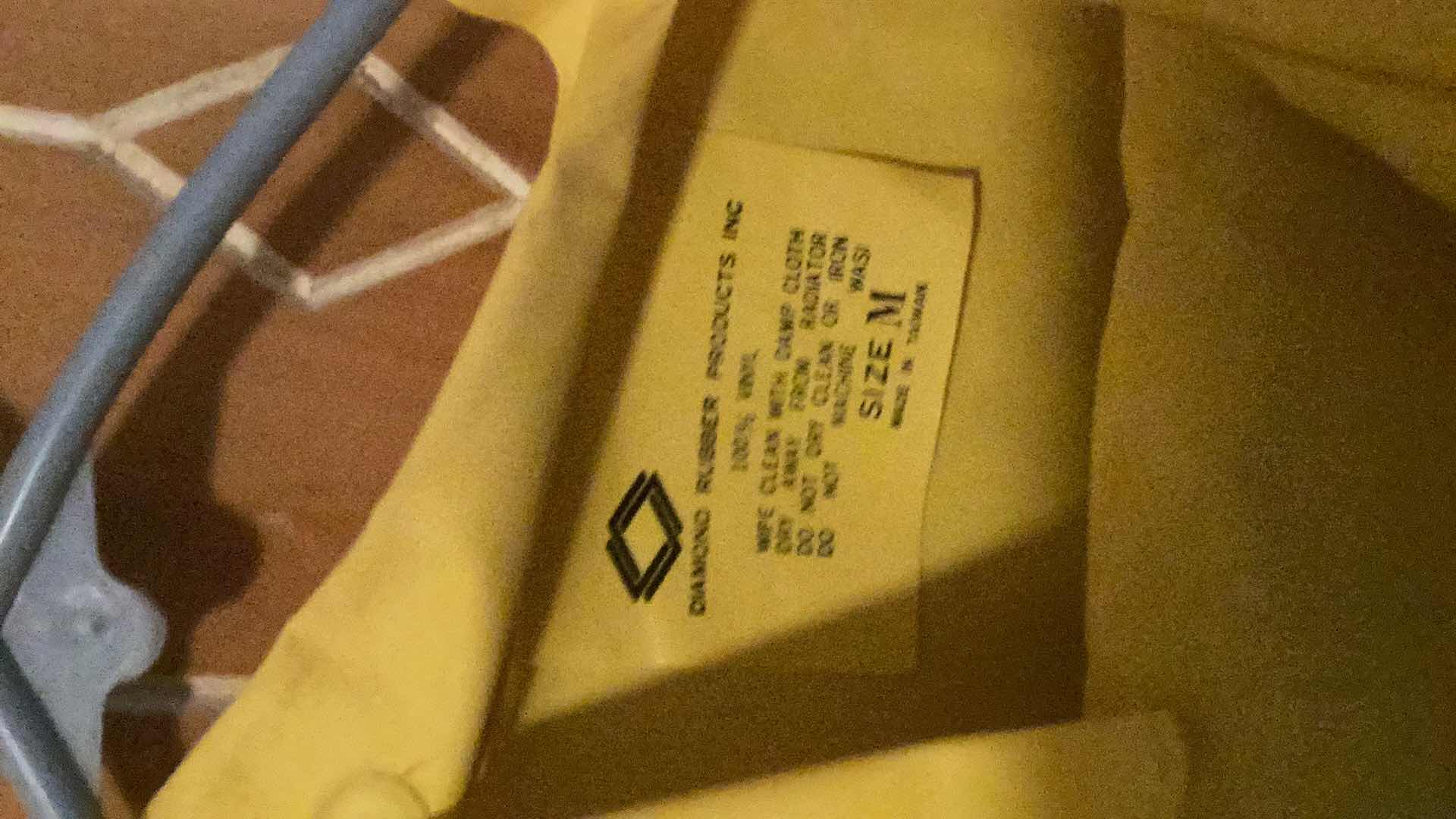 Photo 1 of DIAMOND RUBBER SIZE M JACKET AND 2 PANTS