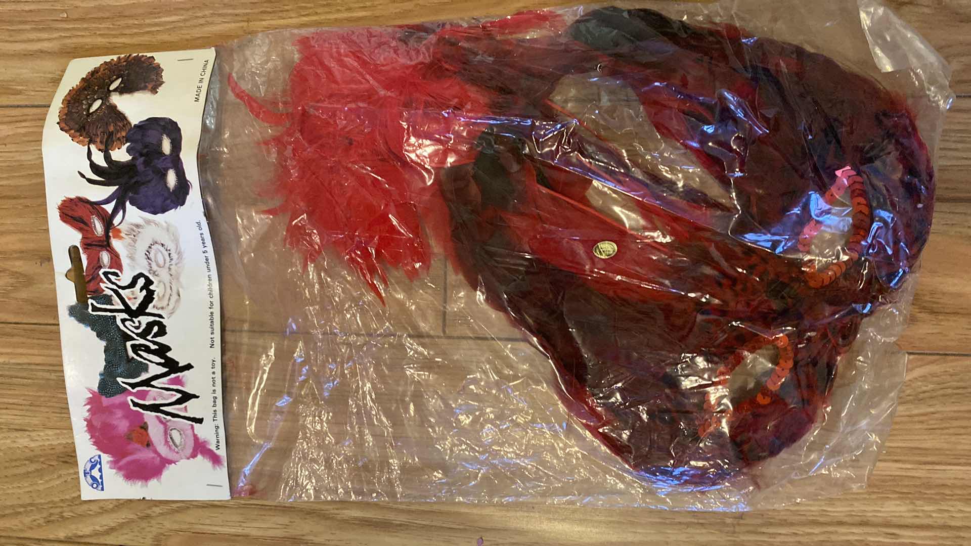 Photo 1 of NEW 4-FEATHER MASKS