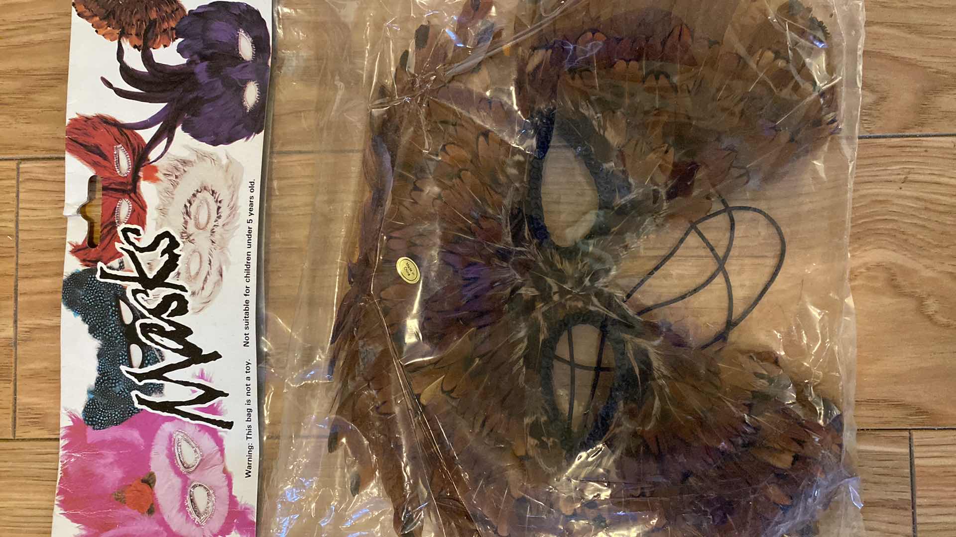 Photo 4 of NEW 4-FEATHER MASKS