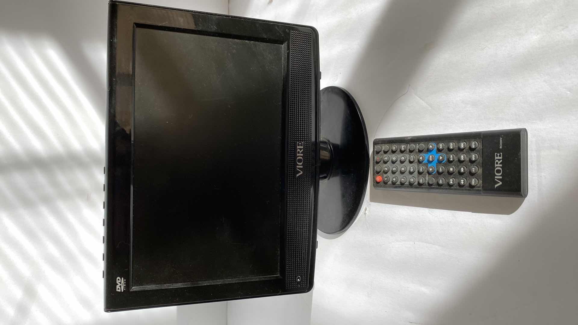 Photo 1 of JENSEN TURNTABLE WITH CD AND CASSETTE MUSIC SYSTEM AND VIOTE DVD VIDEO