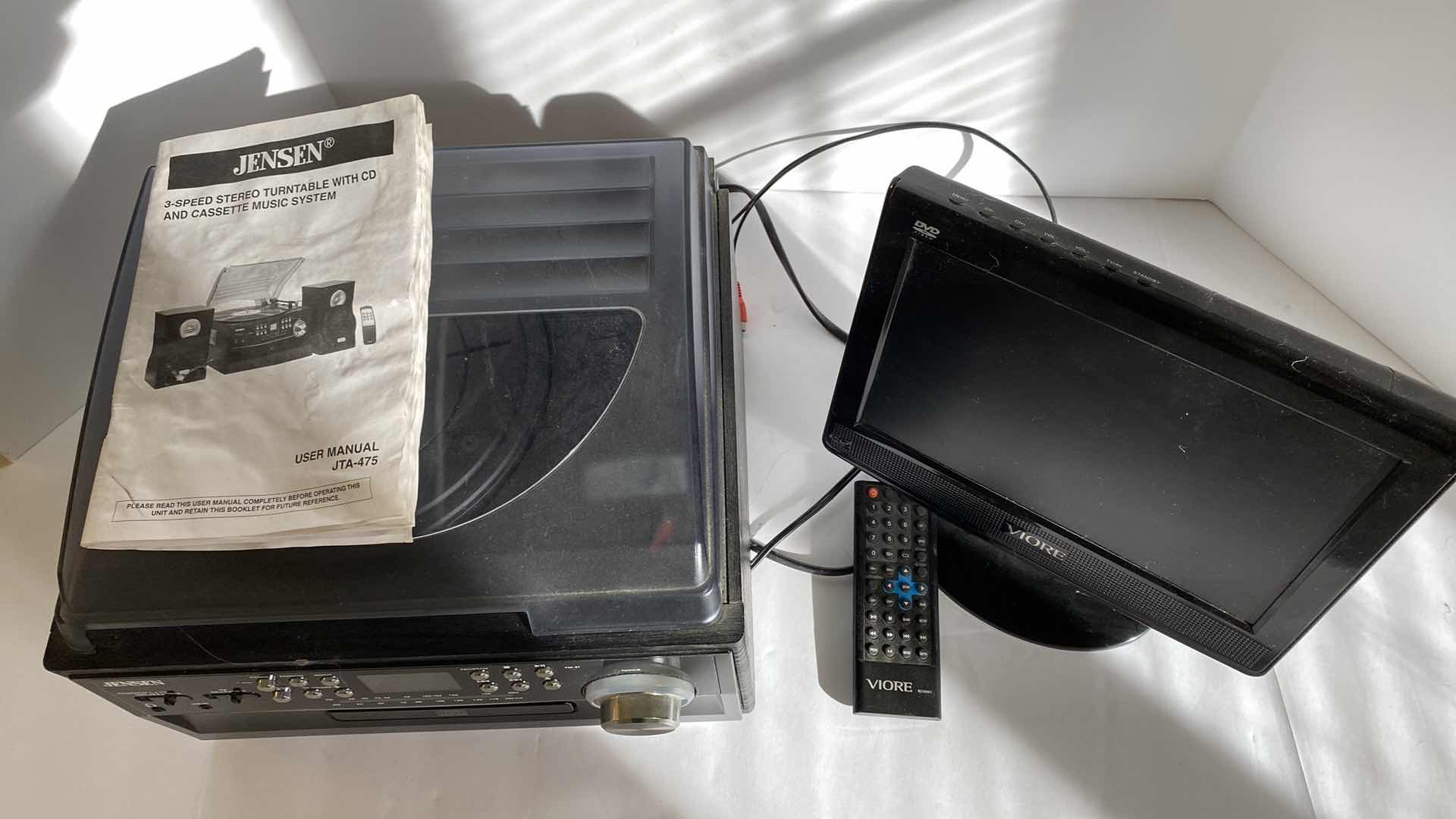 Photo 1 of JENSEN TURNTABLE WITH CD AND CASSETTE MUSIC SYSTEM AND VIOTE DVD VIDEO