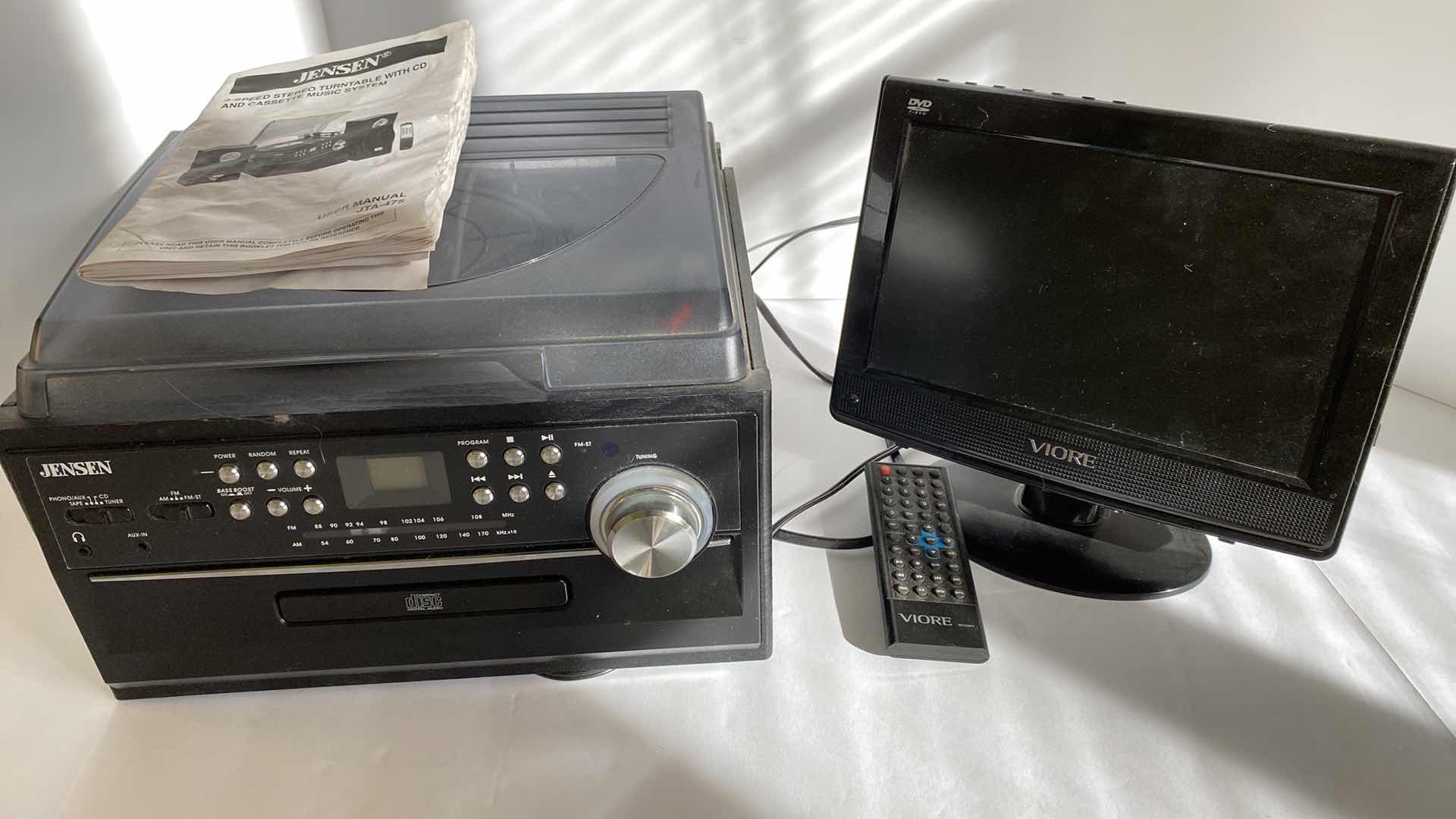 Photo 1 of JENSEN TURNTABLE WITH CD AND CASSETTE MUSIC SYSTEM AND VIOTE DVD VIDEO