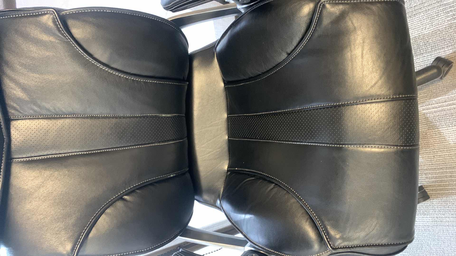 Photo 1 of TRUE INNOVATIONS BLACK BONDED LEATHER ADJUSTABLE ROTATING EXECUTIVE OFFICE CHAIR w WHEELS