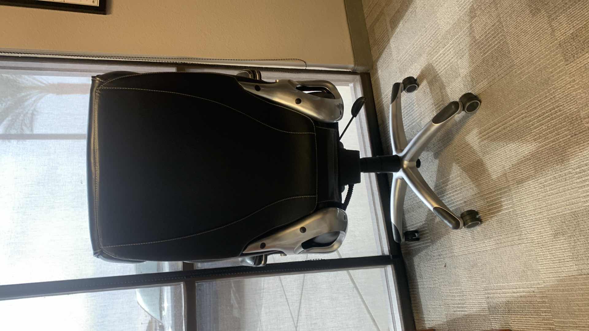 Photo 1 of TRUE INNOVATIONS BLACK BONDED LEATHER ADJUSTABLE ROTATING EXECUTIVE OFFICE CHAIR w WHEELS