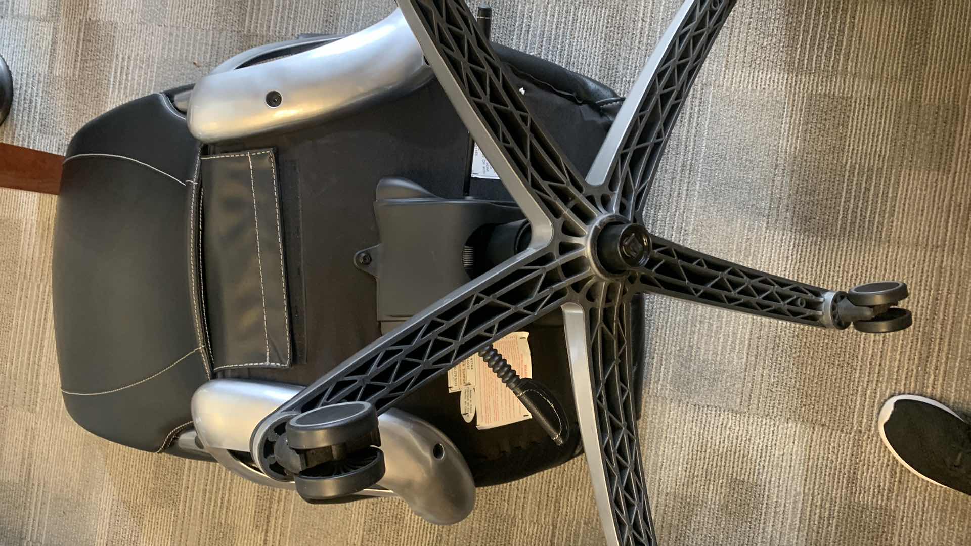 Photo 1 of TRUE INNOVATIONS BLACK BONDED LEATHER ADJUSTABLE ROTATING EXECUTIVE OFFICE CHAIR w WHEELS