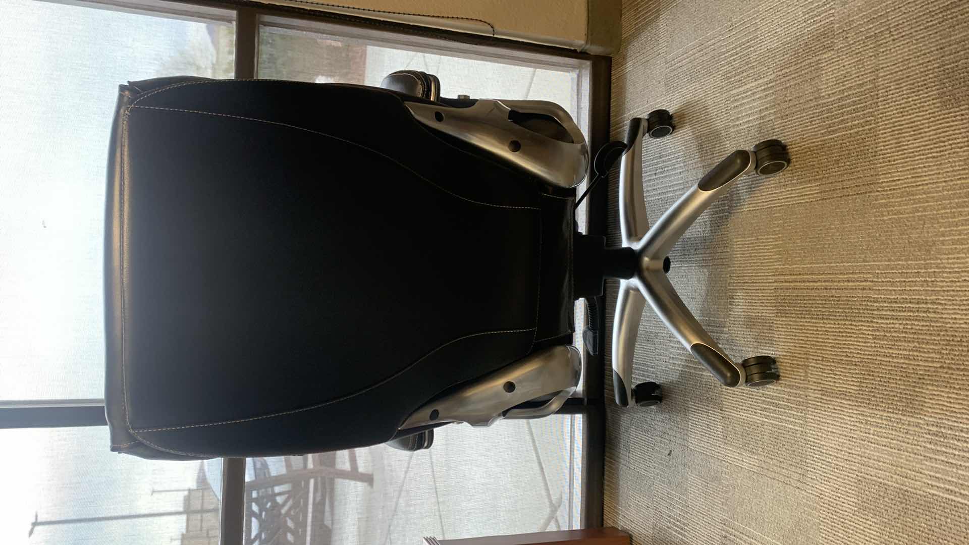 Photo 1 of TRUE INNOVATIONS BLACK BONDED LEATHER ADJUSTABLE ROTATING EXECUTIVE OFFICE CHAIR w WHEELS