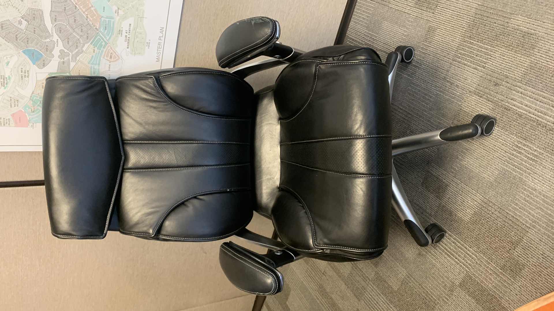 Photo 1 of TRUE INNOVATIONS BLACK BONDED LEATHER ADJUSTABLE ROTATING EXECUTIVE OFFICE CHAIR w WHEELS