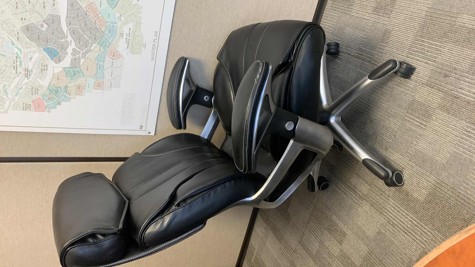 Photo 2 of TRUE INNOVATIONS BLACK BONDED LEATHER ADJUSTABLE ROTATING EXECUTIVE OFFICE CHAIR w WHEELS